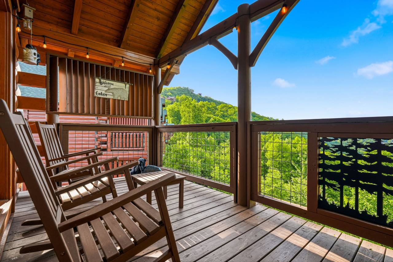 <span class="name">Covered deck with rocking chairs & mountain air</span> <span class="name">Covered deck with rocking chairs & mountain air</span>