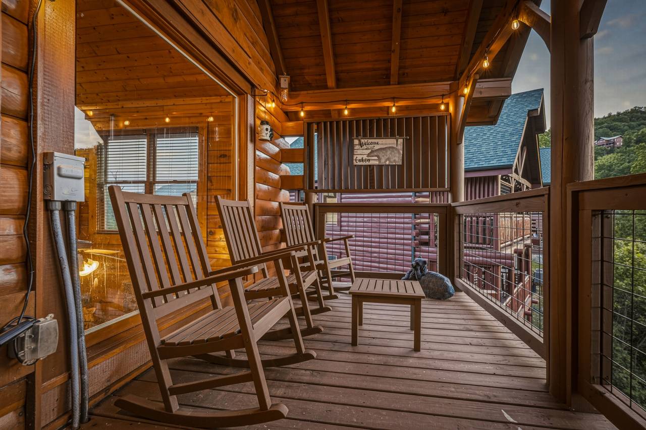 <span class="name">Covered deck with rocking chairs & mountain air</span> <span class="name">Covered deck with rocking chairs & mountain air</span>