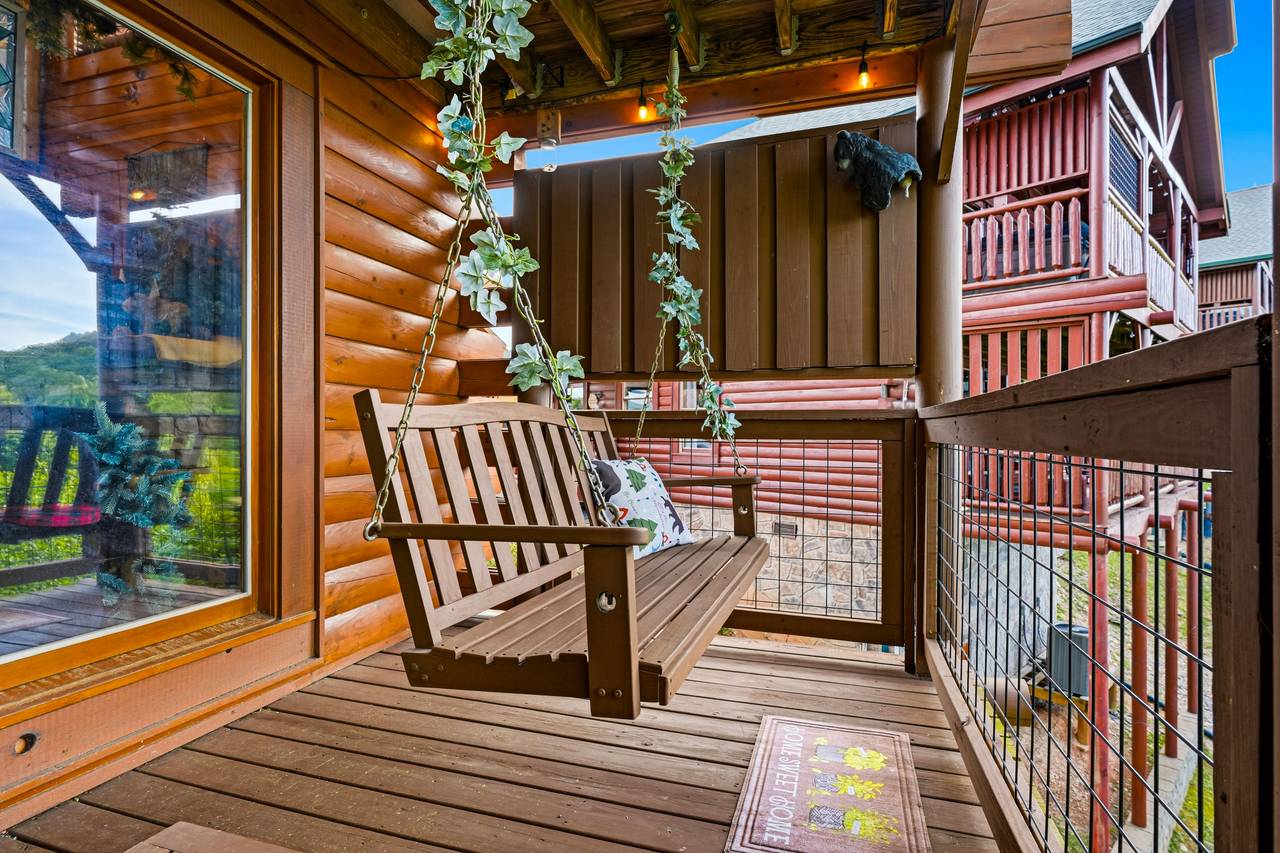 <span class="name">Porch swing with peaceful Smoky Mountain views</span> <span class="name">Porch swing with peaceful Smoky Mountain views</span>