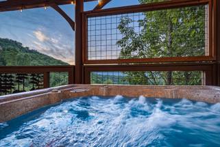 <span class="name">Six-person hot tub with peaceful mountain setting</span> <span class="name">Six-person hot tub with peaceful mountain setting</span>
