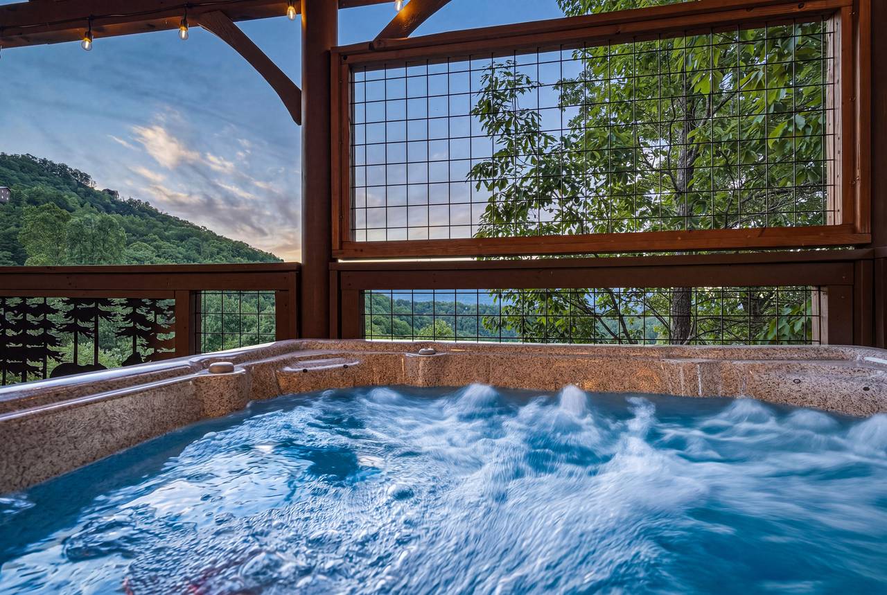 <span class="name">Six-person hot tub with peaceful mountain setting</span> <span class="name">Six-person hot tub with peaceful mountain setting</span>