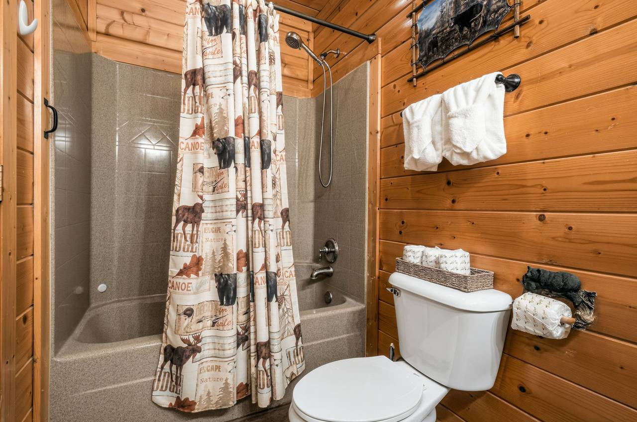 <span class="name">Full bathroom on the main level with tub and shower combo</span> <span class="name">Full bathroom on the main level with tub and shower combo</span>