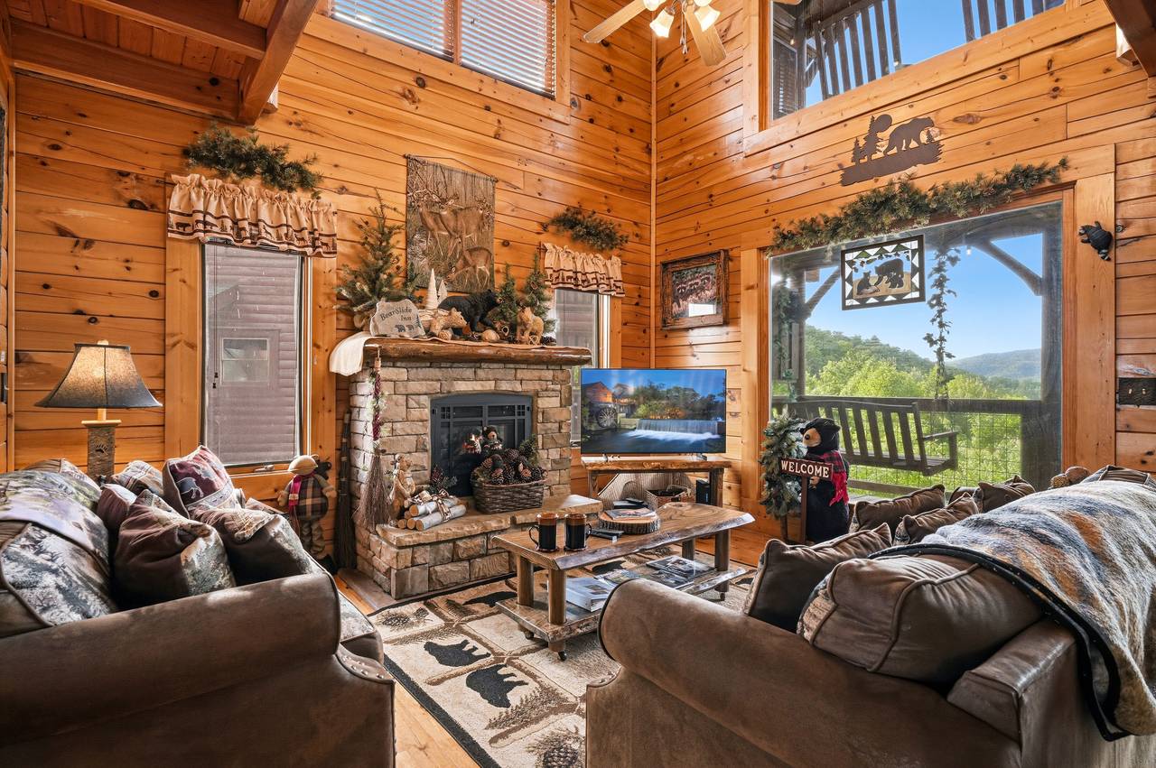 <span class="name">Cozy living room with TV, fireplace, & stunning scenery</span> <span class="name">Cozy living room with TV, fireplace, & stunning scenery</span>
