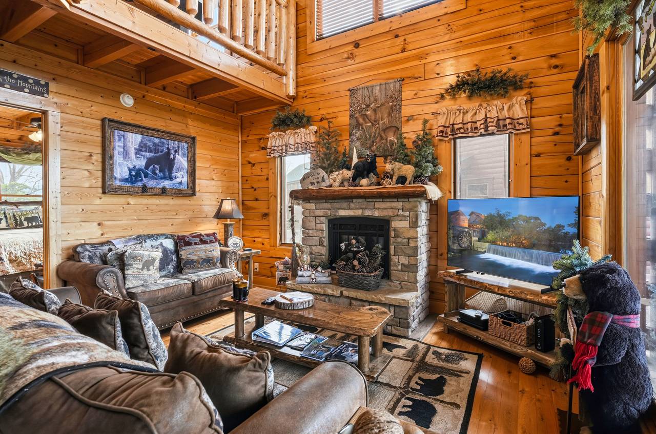 <span class="name">Cozy living room with TV, fireplace, & stunning scenery</span> <span class="name">Cozy living room with TV, fireplace, & stunning scenery</span>