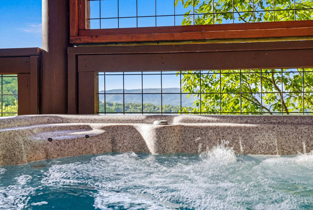 <span class="name">Six-person hot tub with peaceful mountain setting</span> <span class="name">Six-person hot tub with peaceful mountain setting</span>