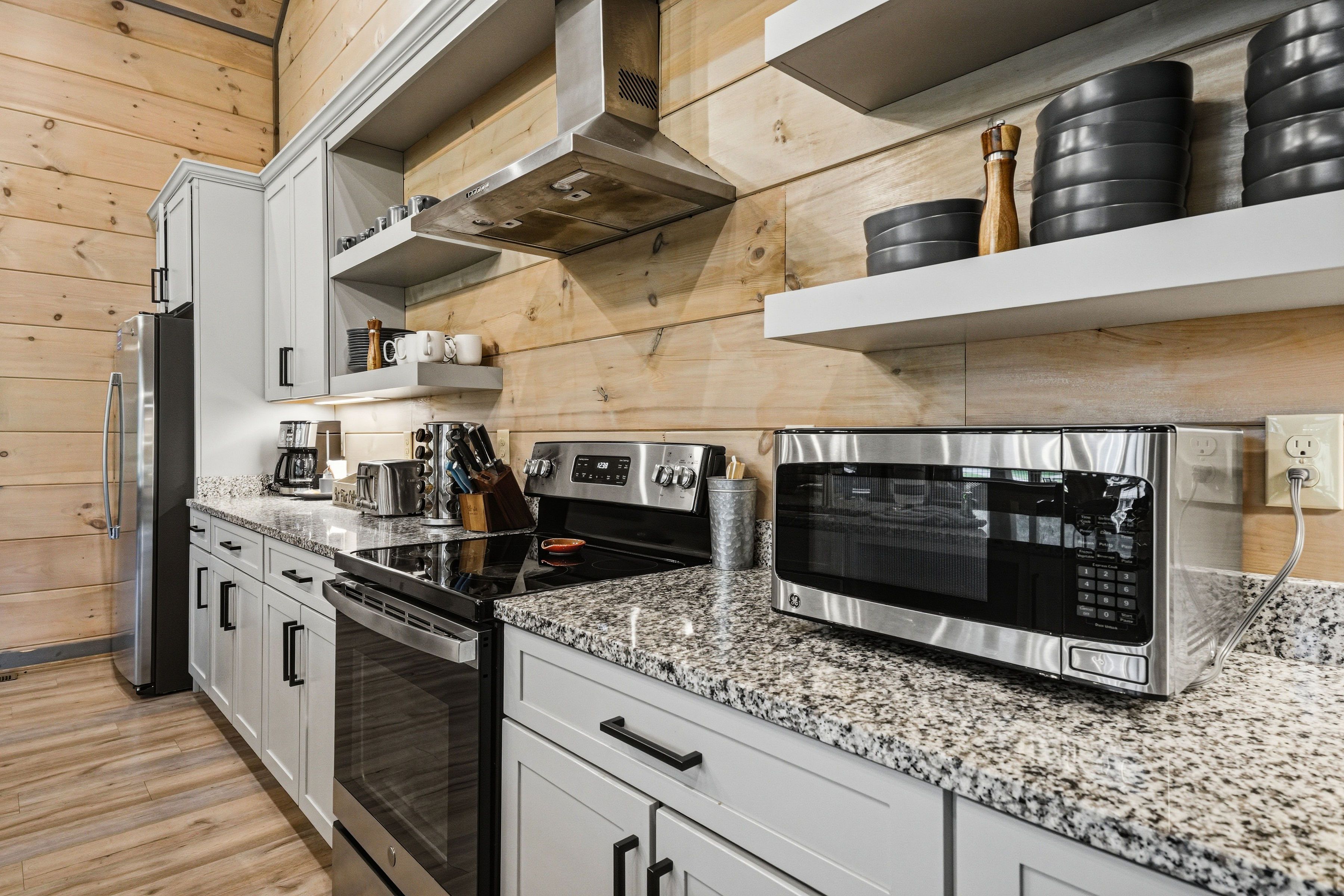 <span class="name">Fully equipped upper-level kitchen for family meals</span>