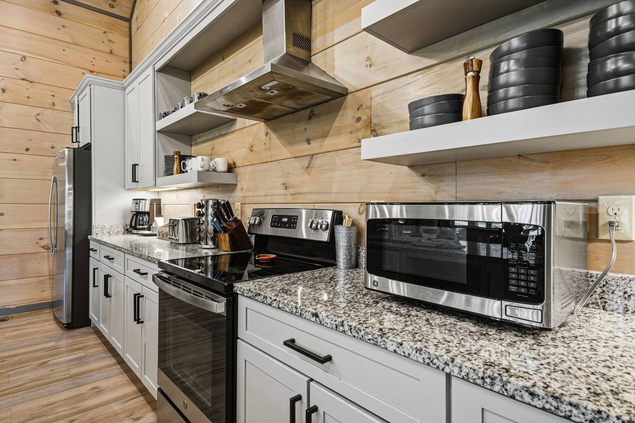 <span class="name">Fully equipped upper-level kitchen for family meals</span> <span class="name">Fully equipped upper-level kitchen for family meals</span>