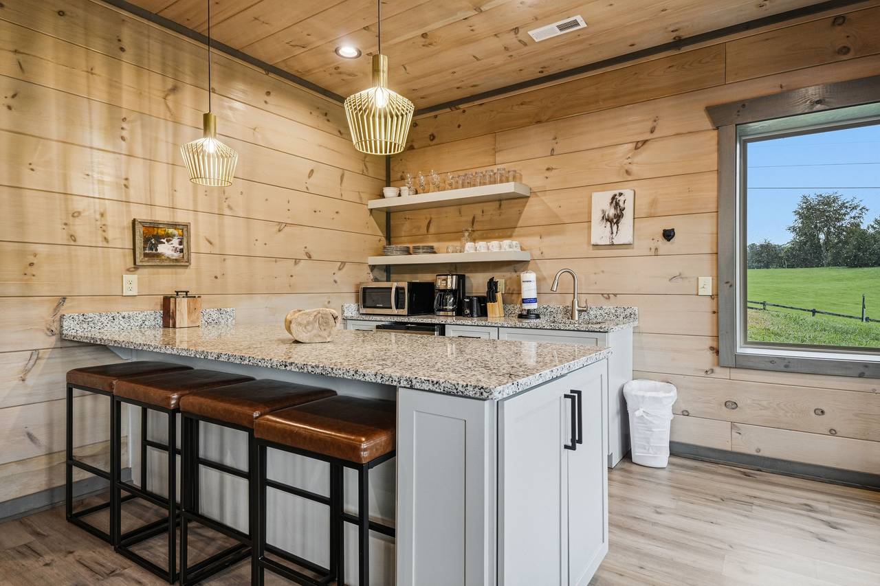 <span class="name">Lower-level wet bar keeps drinks close to the game room</span> <span class="name">Lower-level wet bar keeps drinks close to the game room</span>