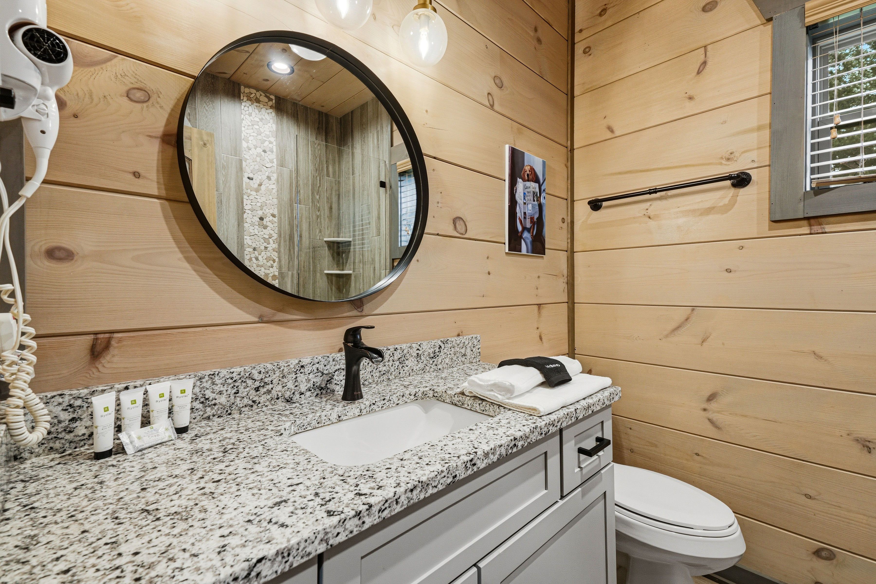 <span class="name">Ensuite bath also serves the game room and living area</span>