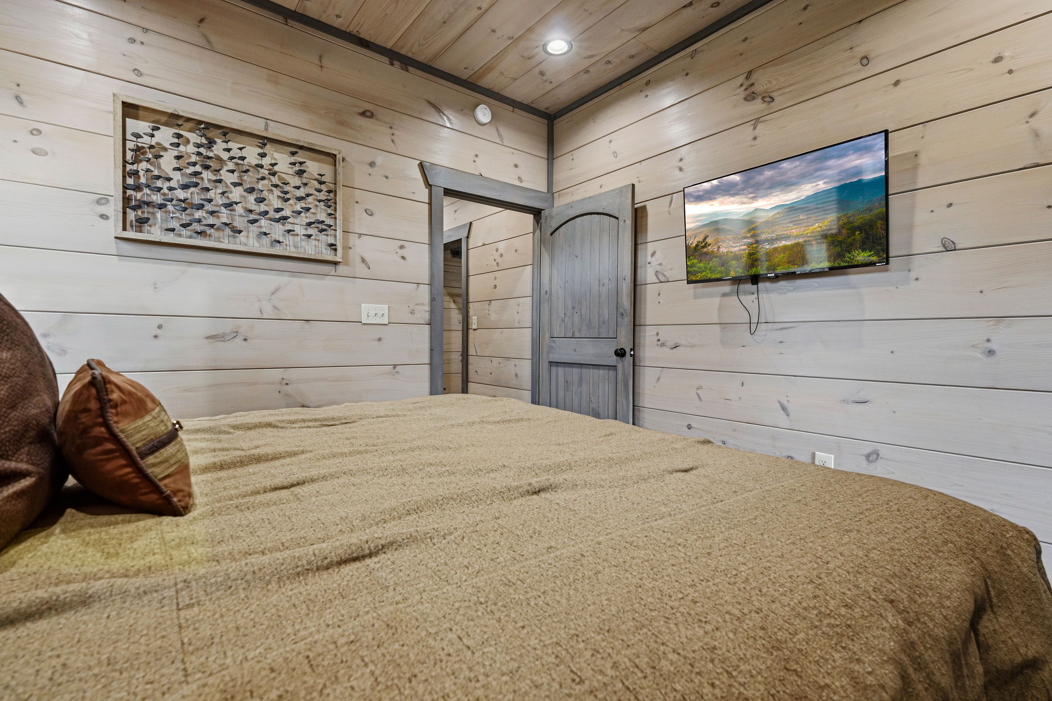 <span class="name">Comfortable king bed creates a peaceful guest retreat</span>