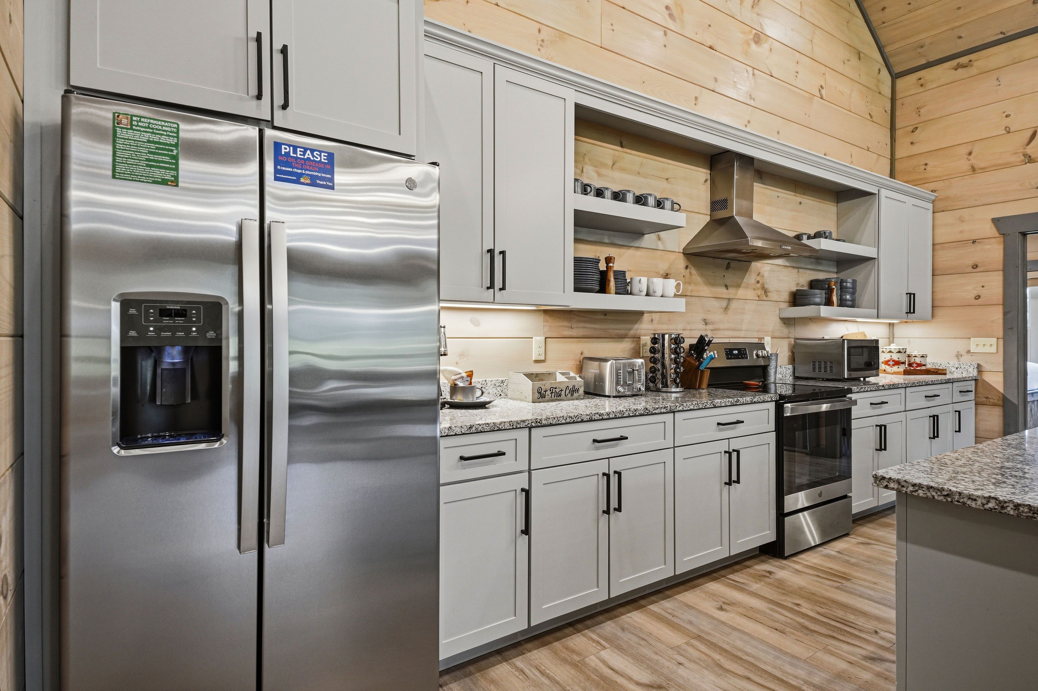 <span class="name">Fully equipped upper-level kitchen for family meals</span>