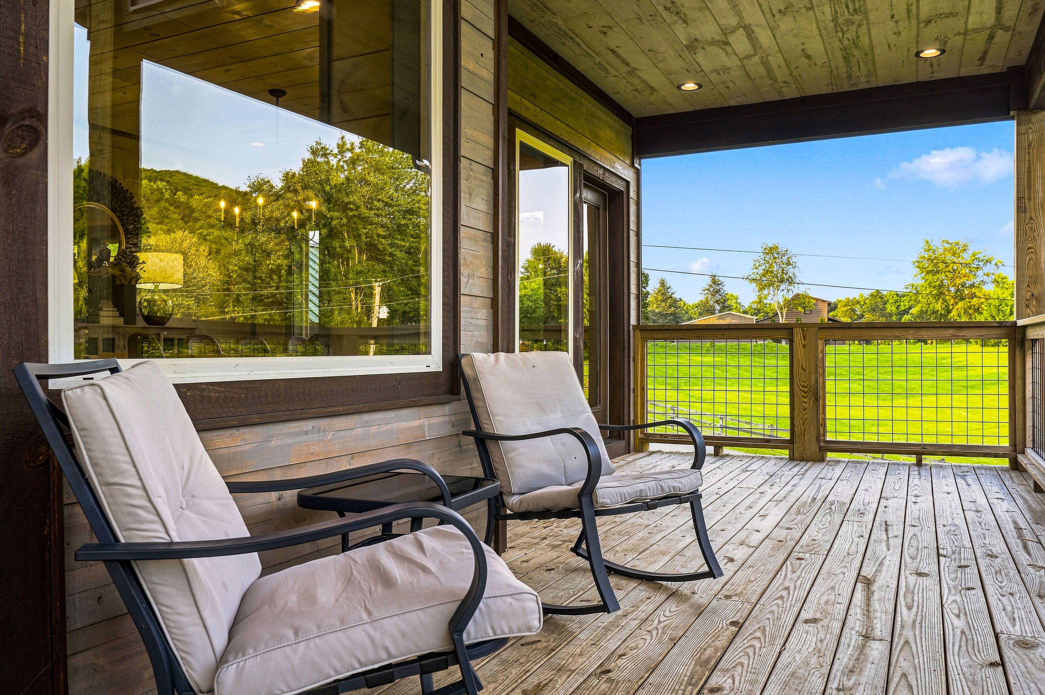 <span class="name">Rocking chairs overlook the beautiful Smoky Mountains</span>