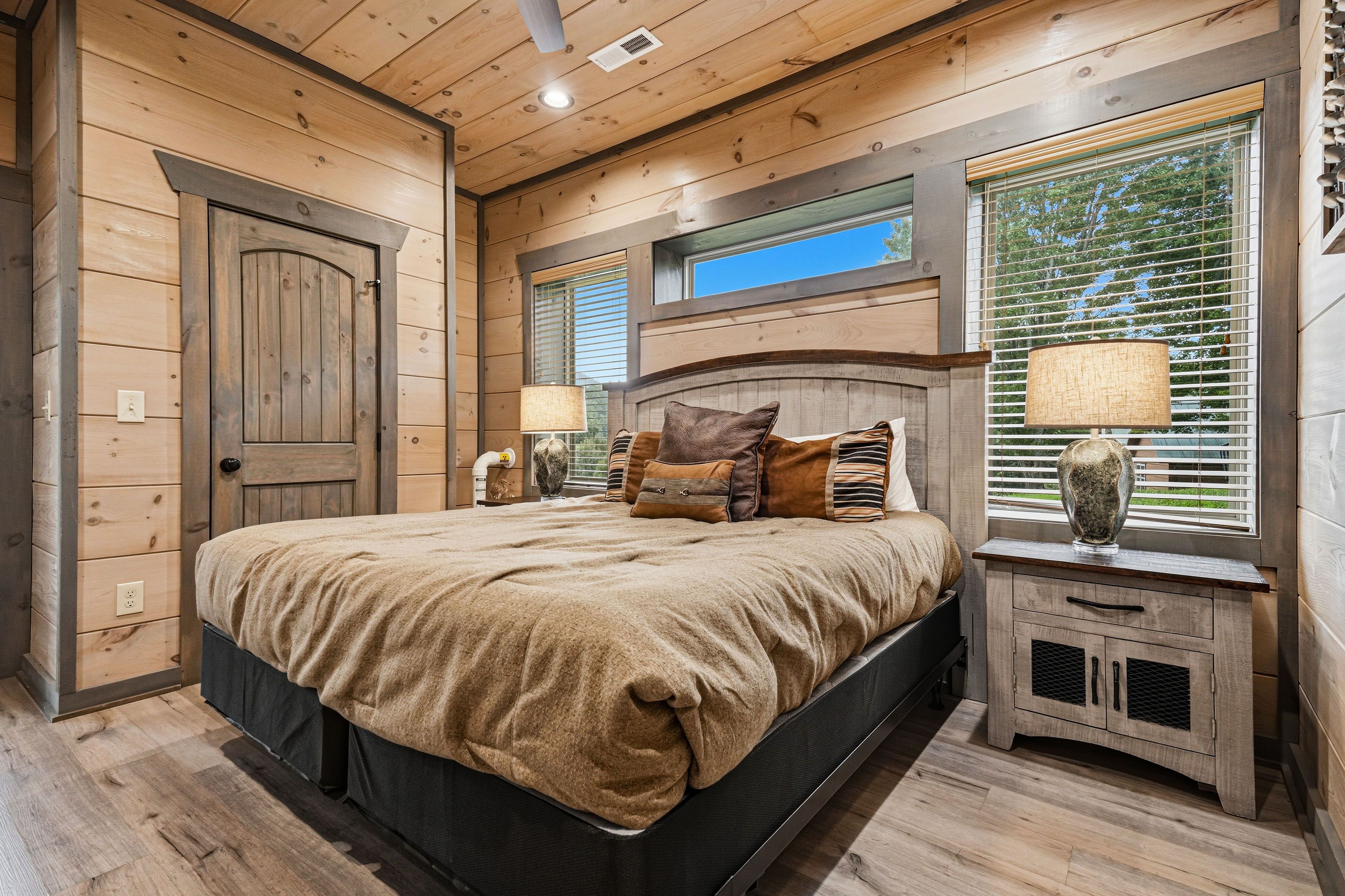 <span class="name">Lower-level king bedroom with private ensuite bathroom</span>