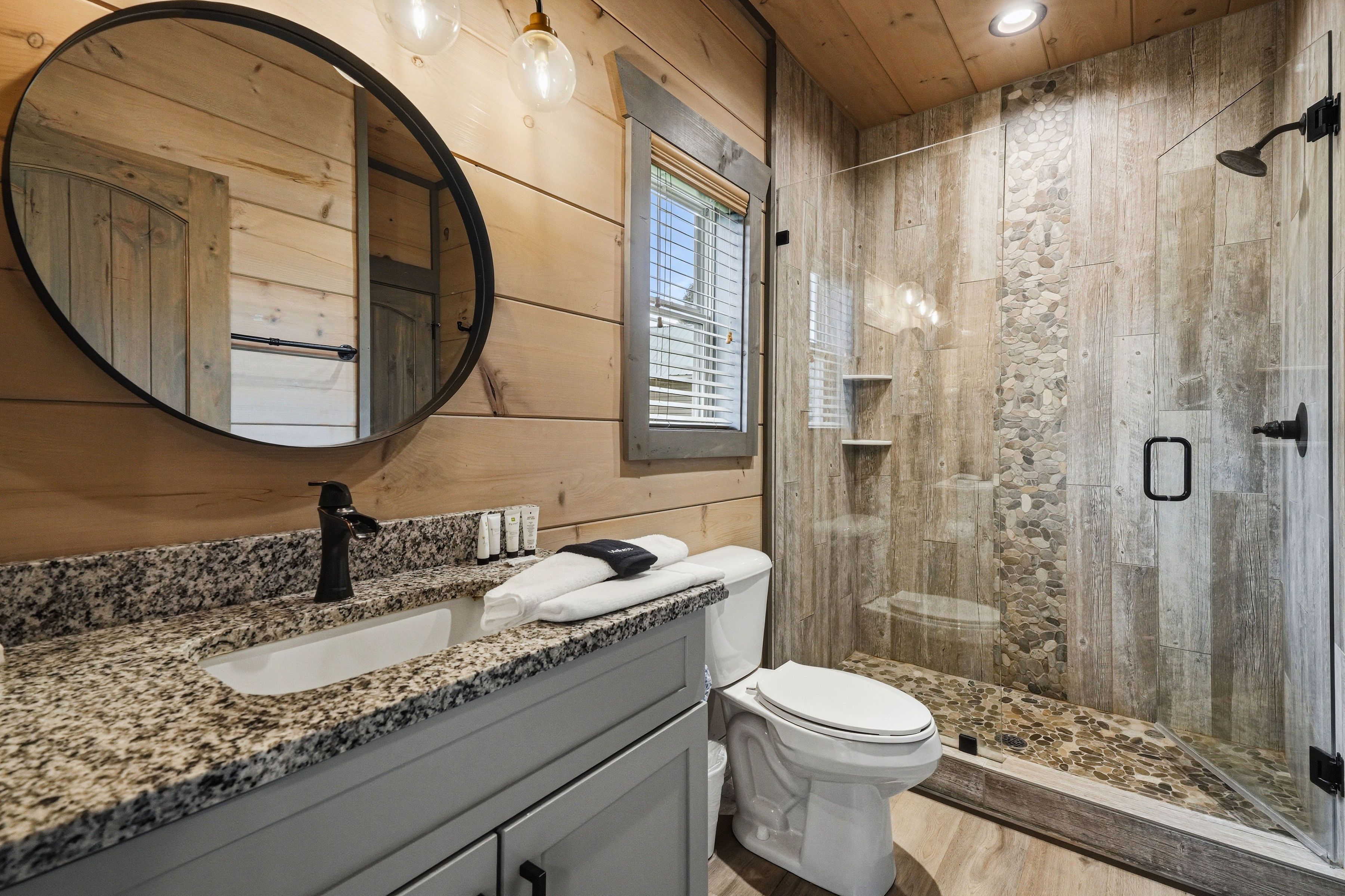<span class="name">Upper-level Bedroom  has a private ensuite bathroom</span>