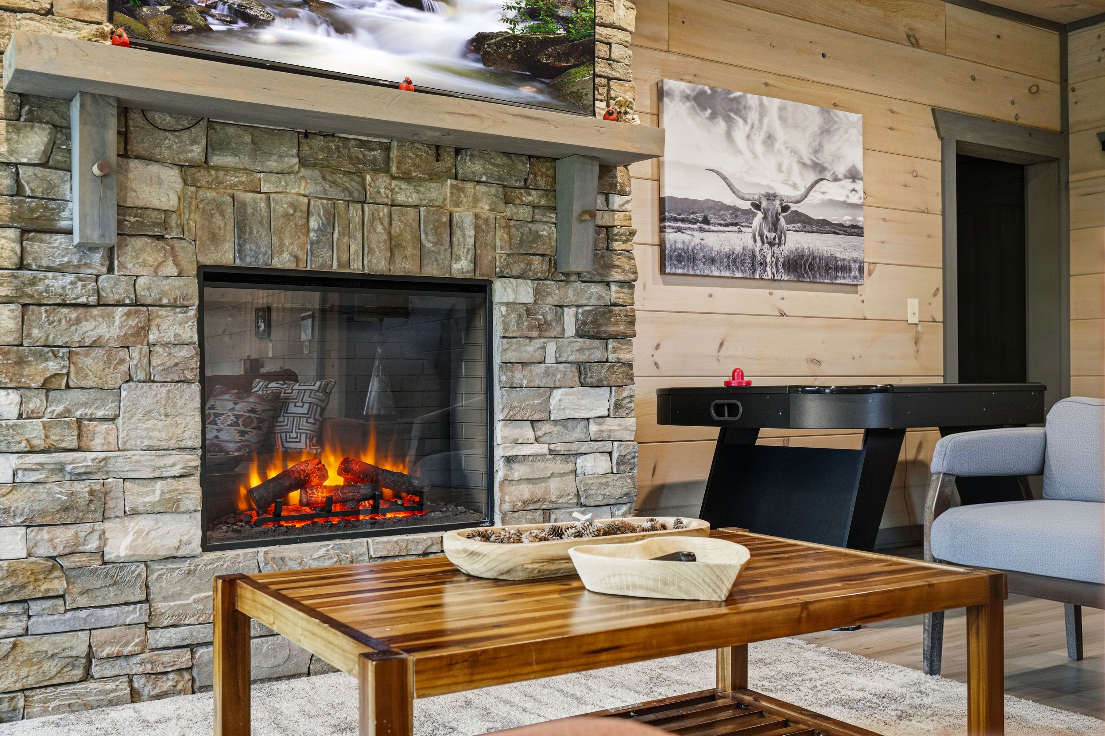 <span class="name">Game room fireplace creates a cozy gathering space</span>