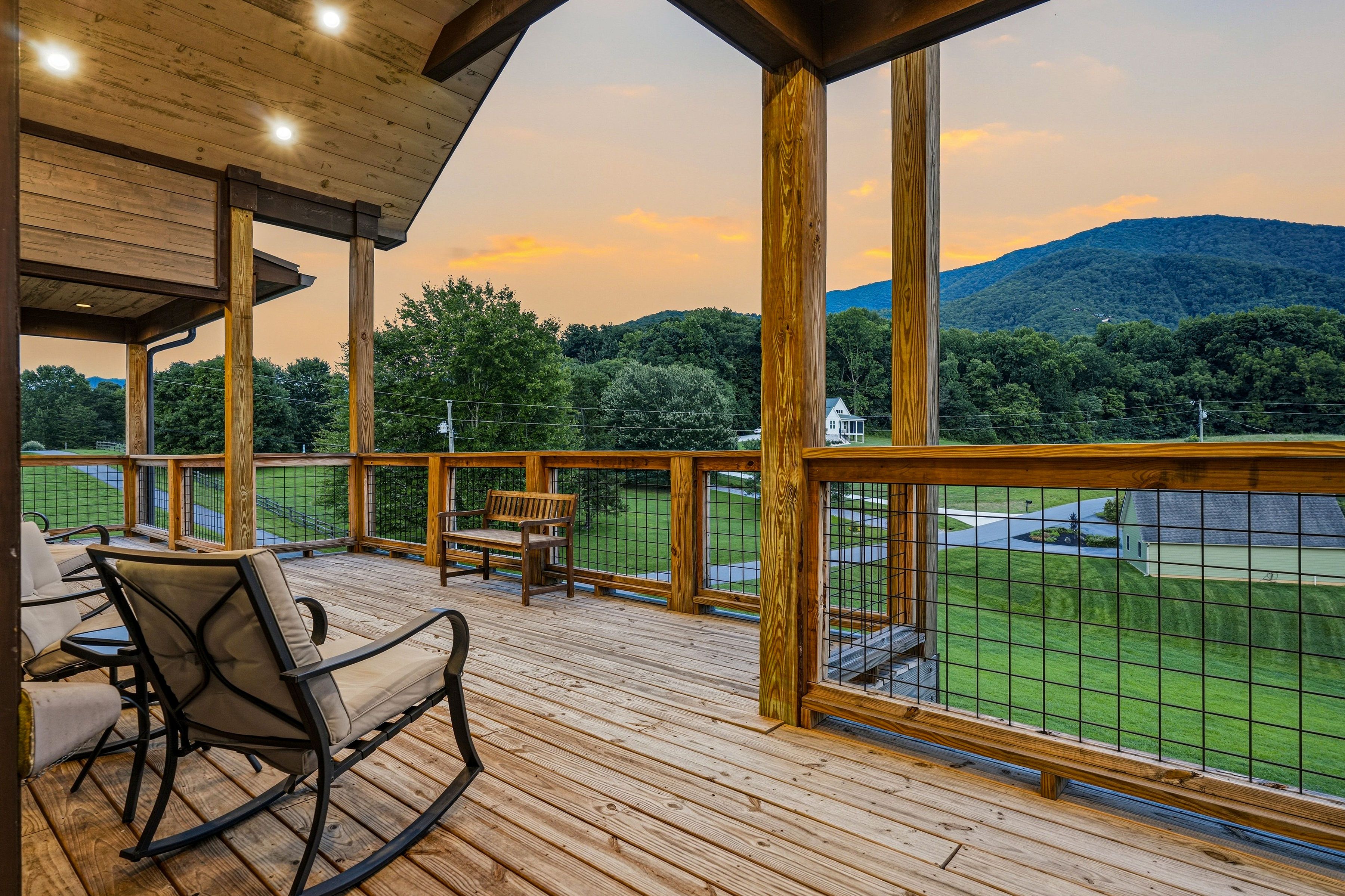 <span class="name">Two spacious covered decks showcase mountain views</span>