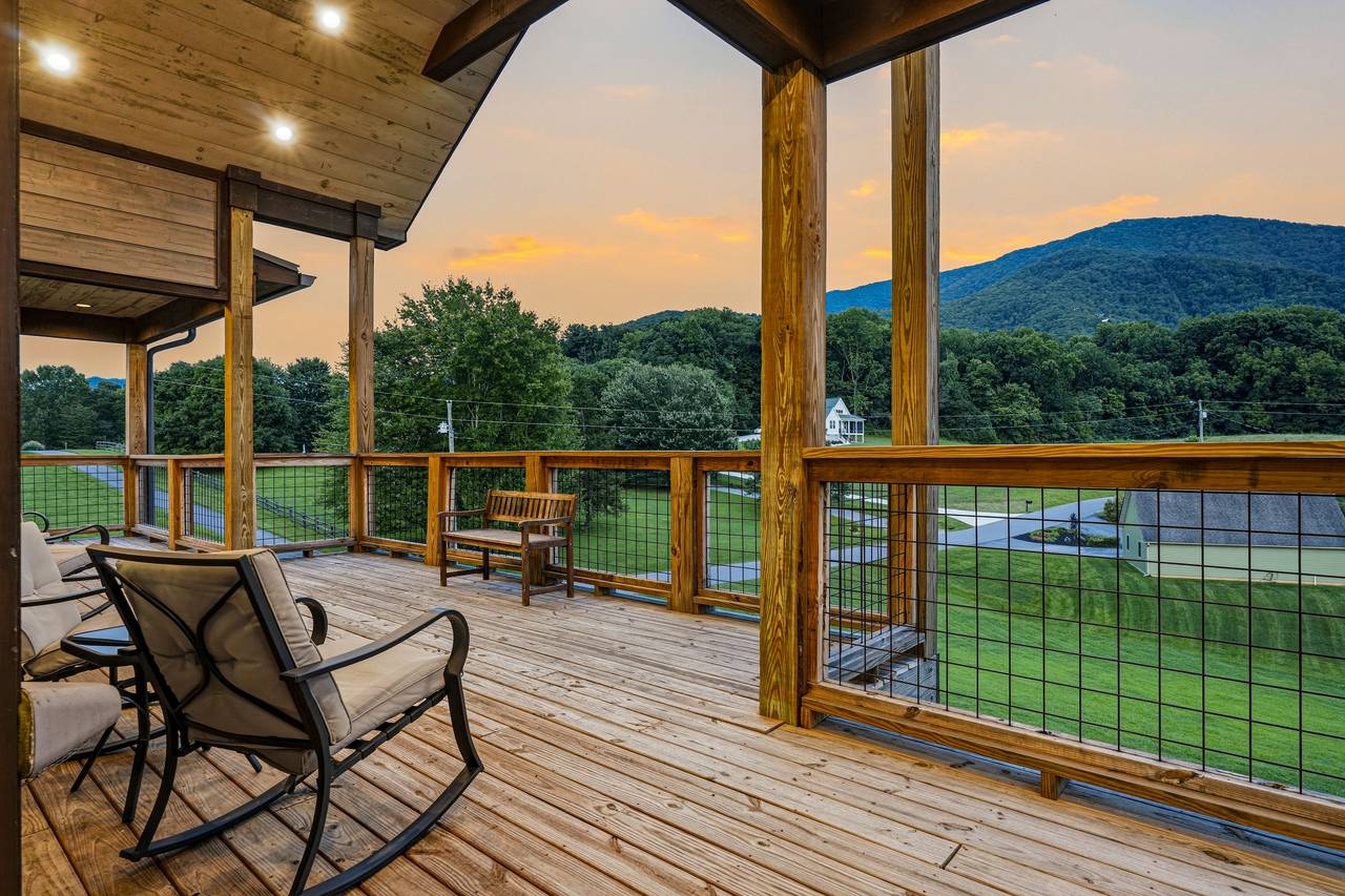 <span class="name">Two spacious covered decks showcase mountain views</span> <span class="name">Two spacious covered decks showcase mountain views</span>