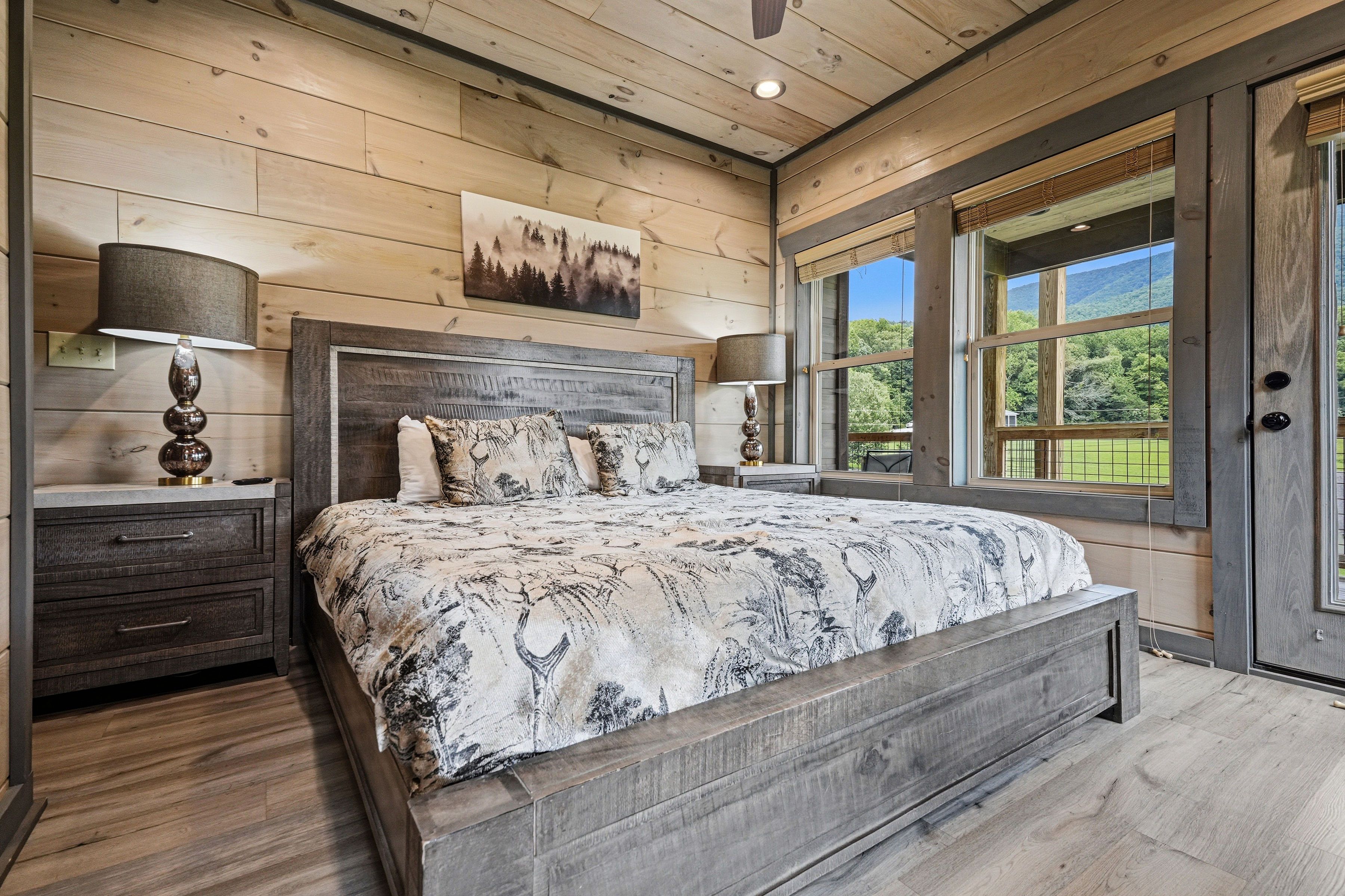<span class="name">Upper-level king bedroom with private ensuite bathroom</span>