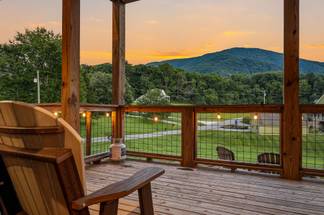 <span class="name">Rocking chairs overlook the beautiful Smoky Mountains</span> <span class="name">Rocking chairs overlook the beautiful Smoky Mountains</span>
