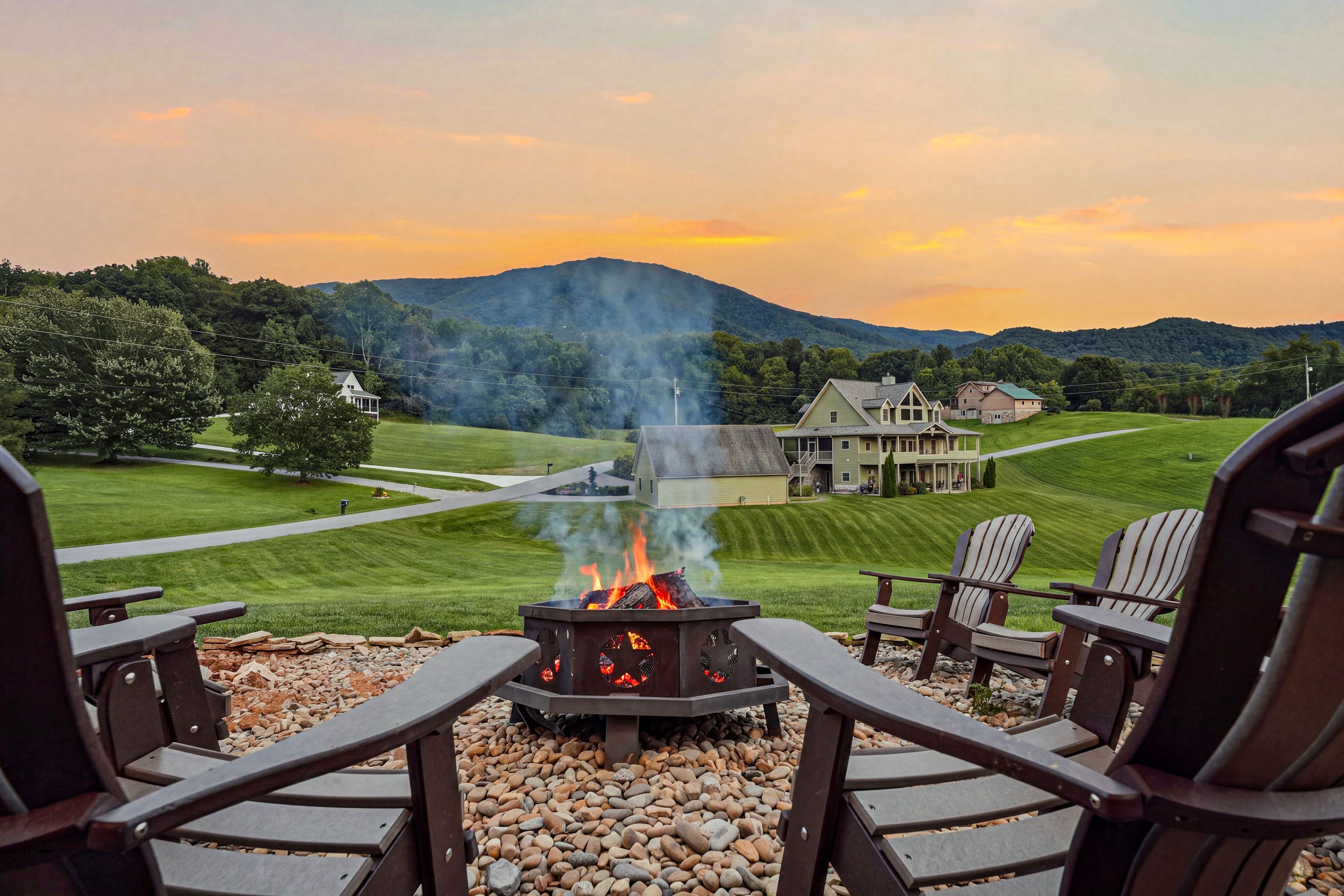 <span class="name">Outdoor fire pit features a scenic mountain backdrop</span>