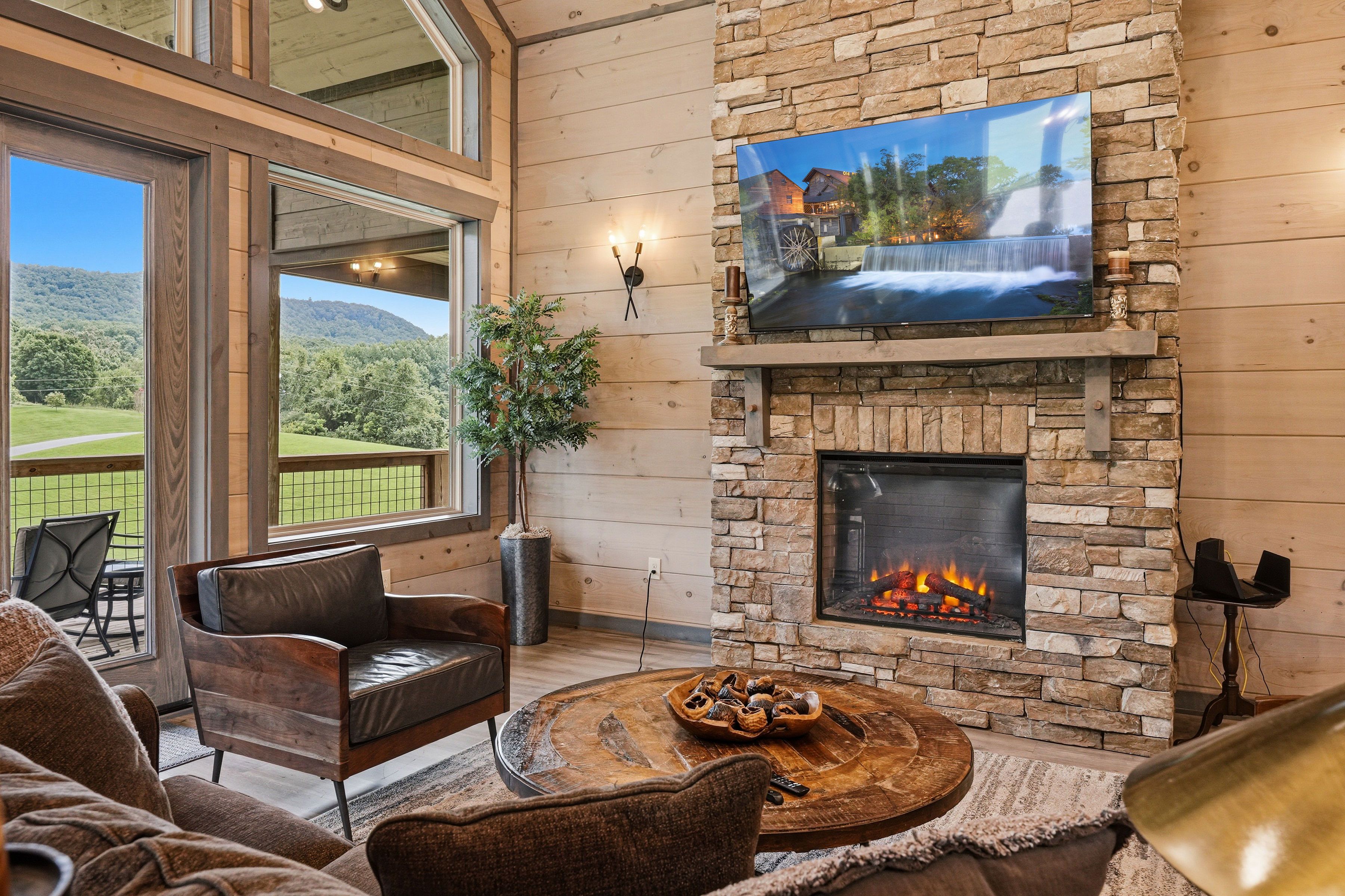 <span class="name">Living room fireplace creates a cozy mountain setting</span>