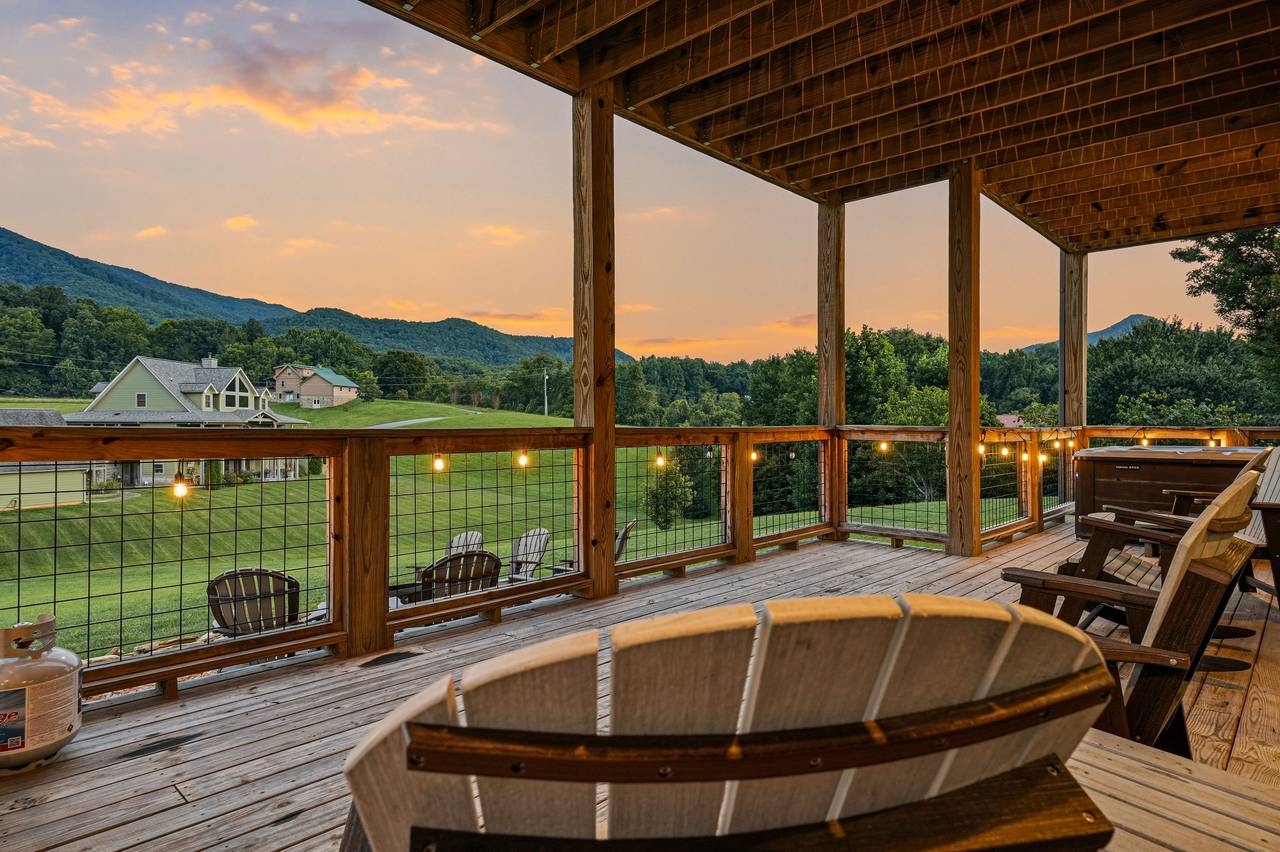 <span class="name">Two spacious covered decks showcase mountain views</span> <span class="name">Two spacious covered decks showcase mountain views</span>