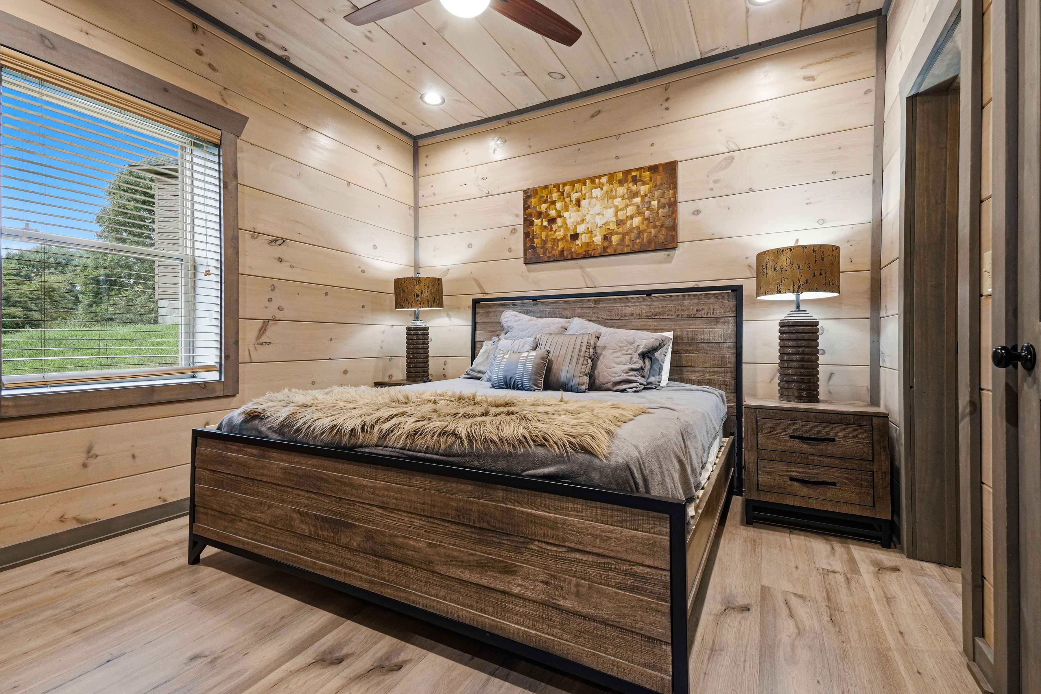 <span class="name">Lower-level king bedroom with ensuite and shared bath</span>