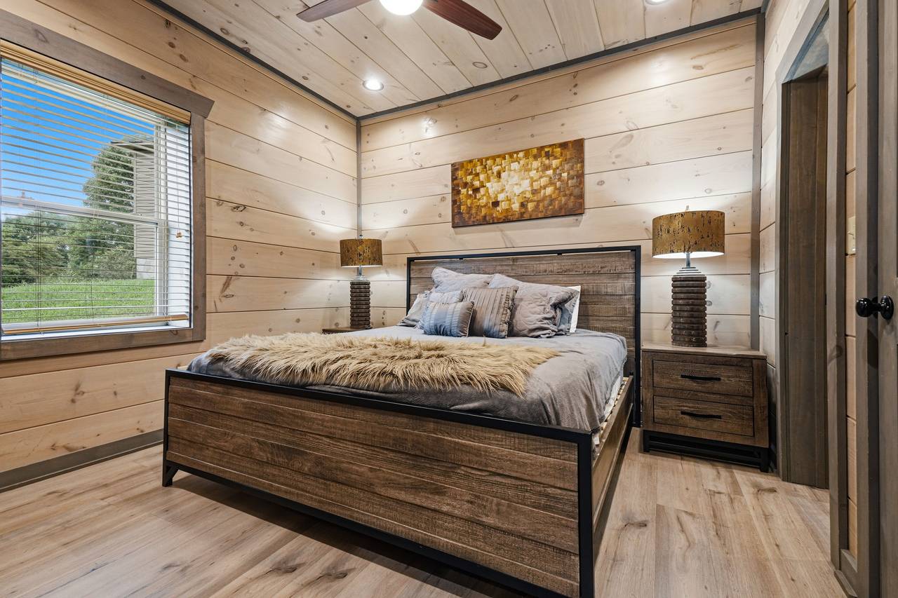 <span class="name">Lower-level king bedroom with ensuite and shared bath</span> <span class="name">Lower-level king bedroom with ensuite and shared bath</span>