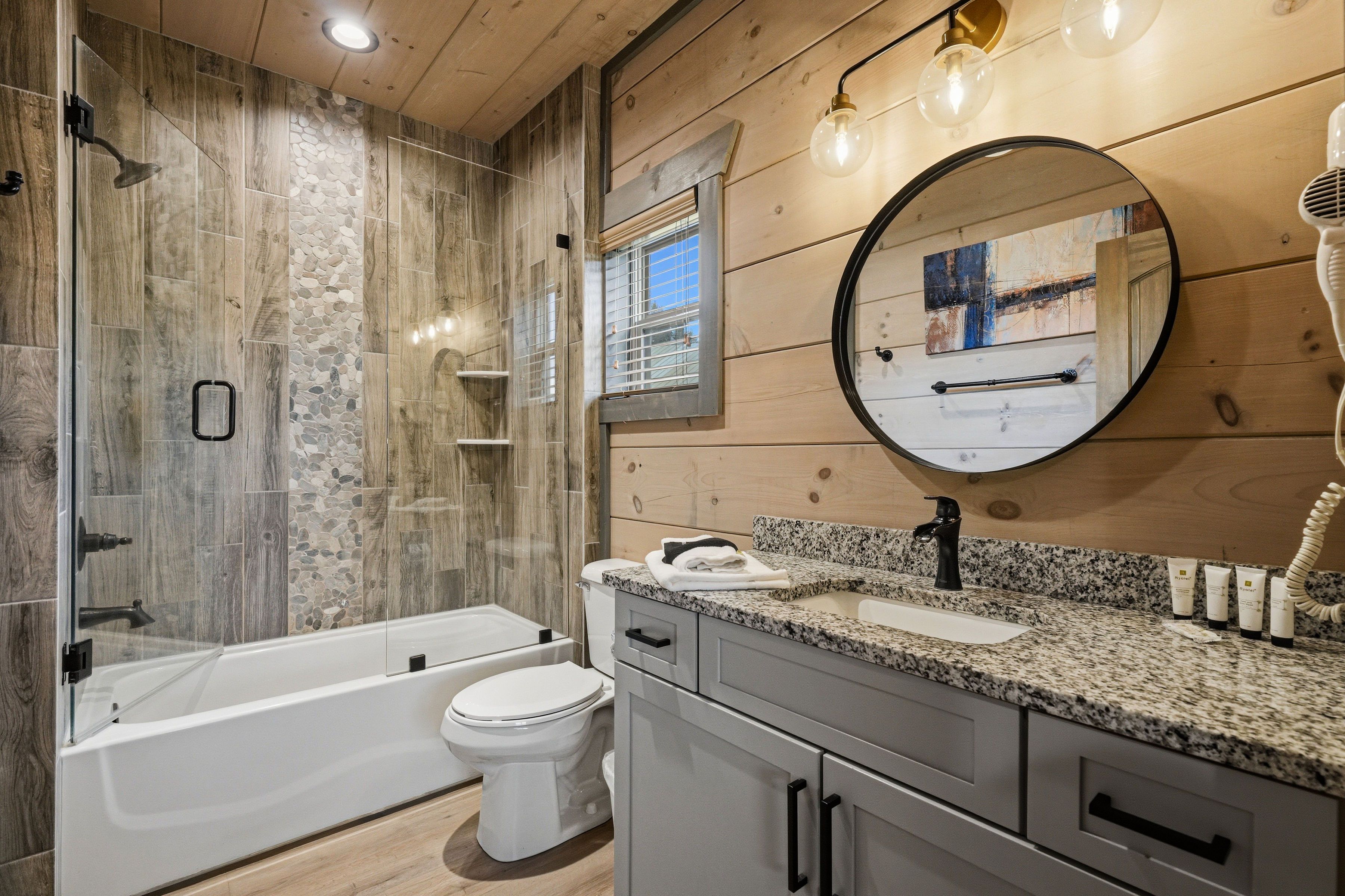 <span class="name">Two full bathrooms have tub and shower combinations</span>