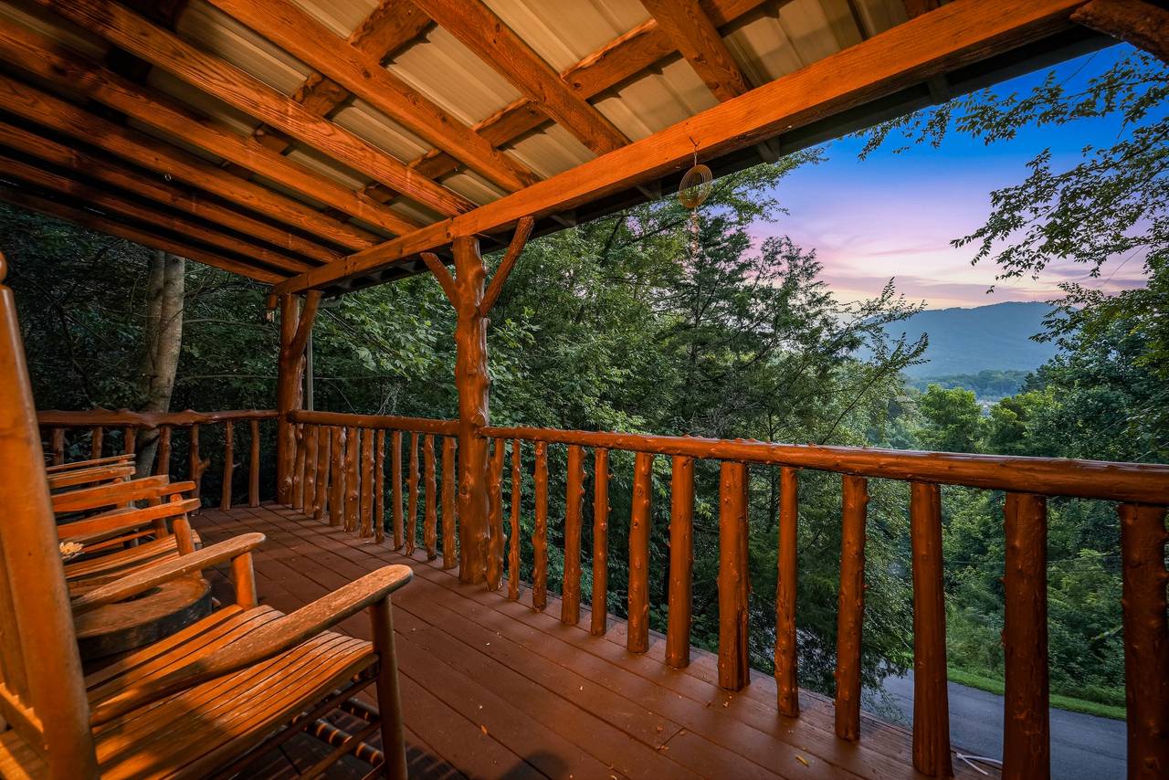 <span class="name">Smoky Mountain views peek through the trees from the deck</span> <span class="name">Smoky Mountain views peek through the trees from the deck</span>