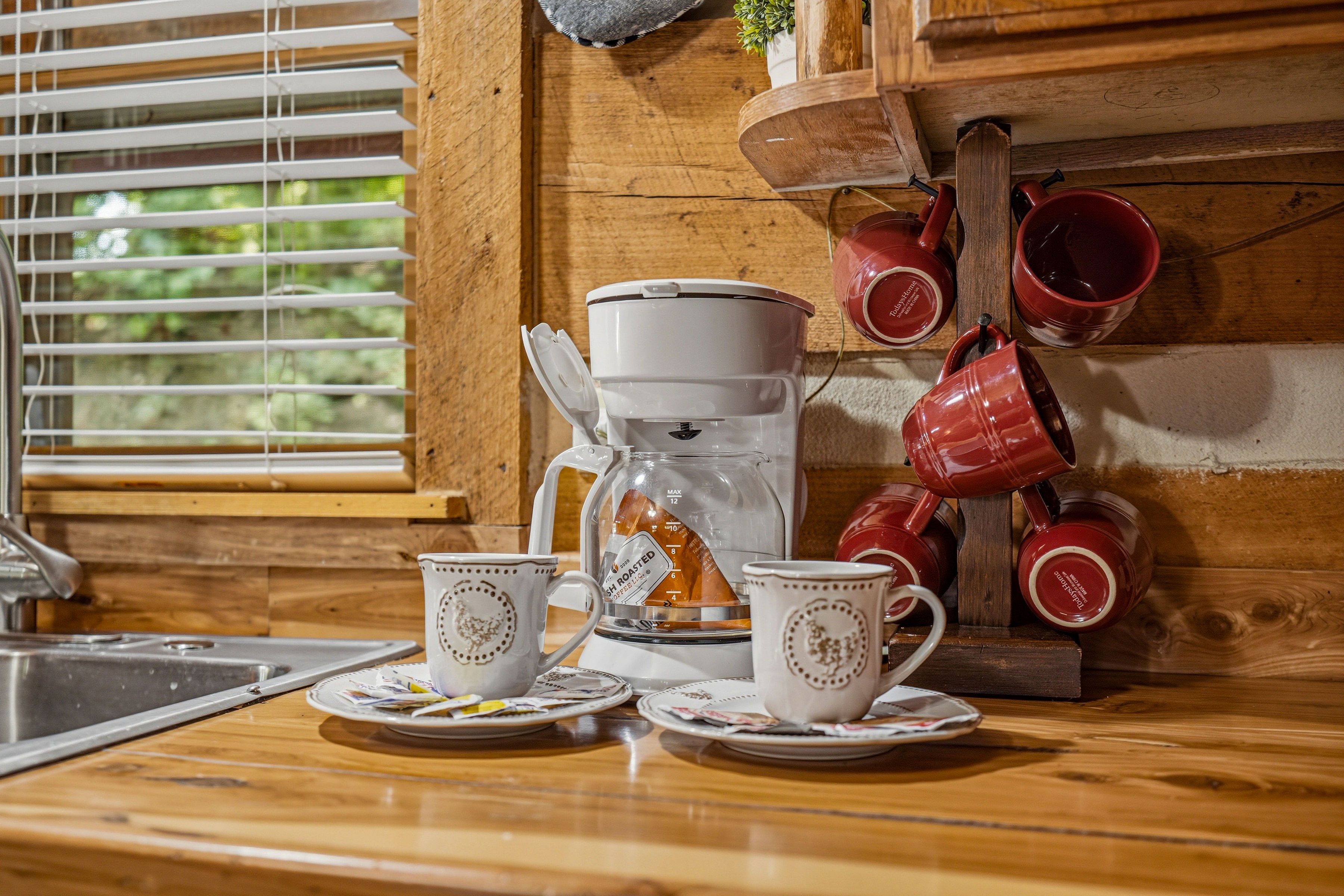 <span class="name">Kitchen includes a coffee pot for easy mornings</span>