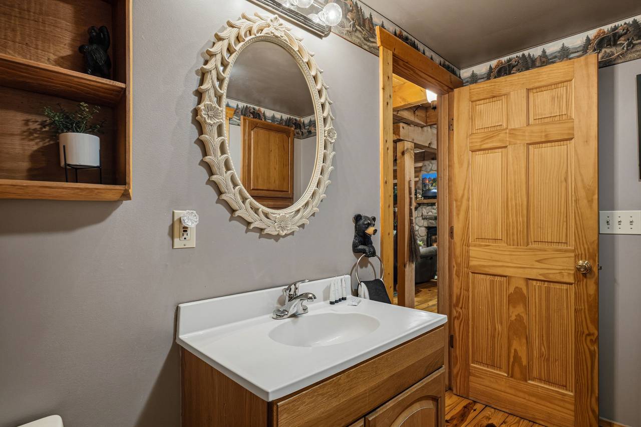<span class="name">Entry-level full bathroom with tub and shower combination</span> <span class="name">Entry-level full bathroom with tub and shower combination</span>