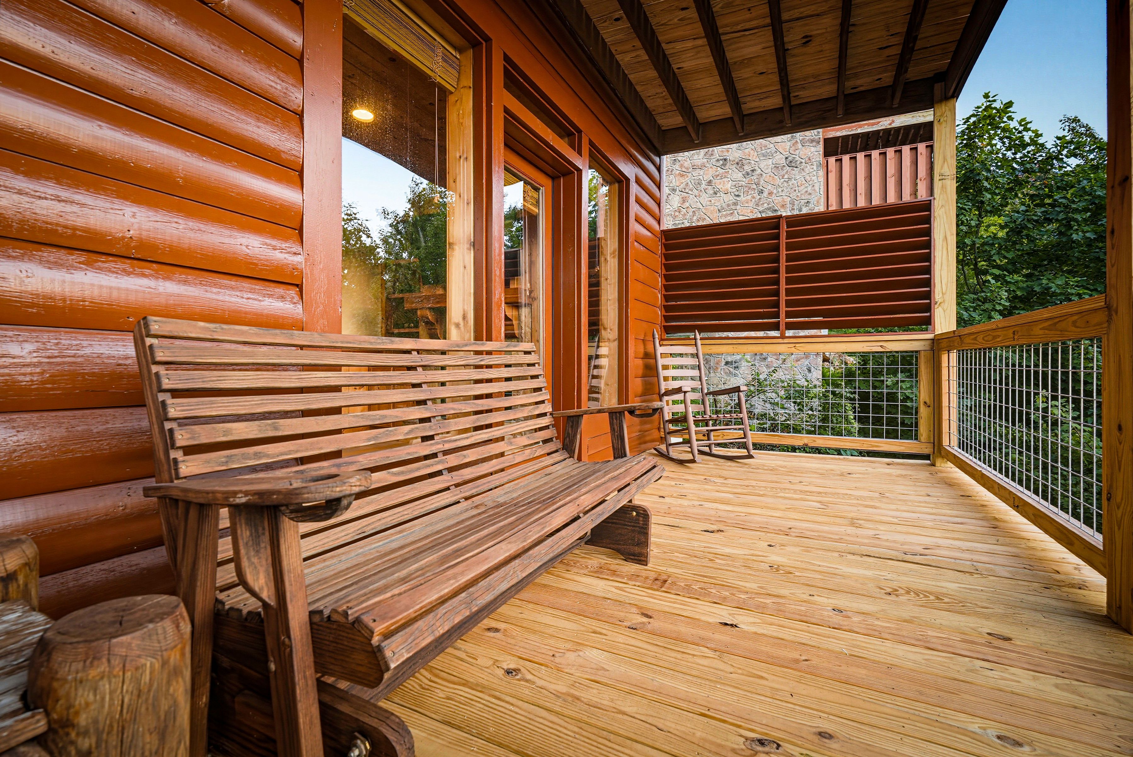 <span class="name">Unwind on the bench glider while enjoying the mountain air</span>