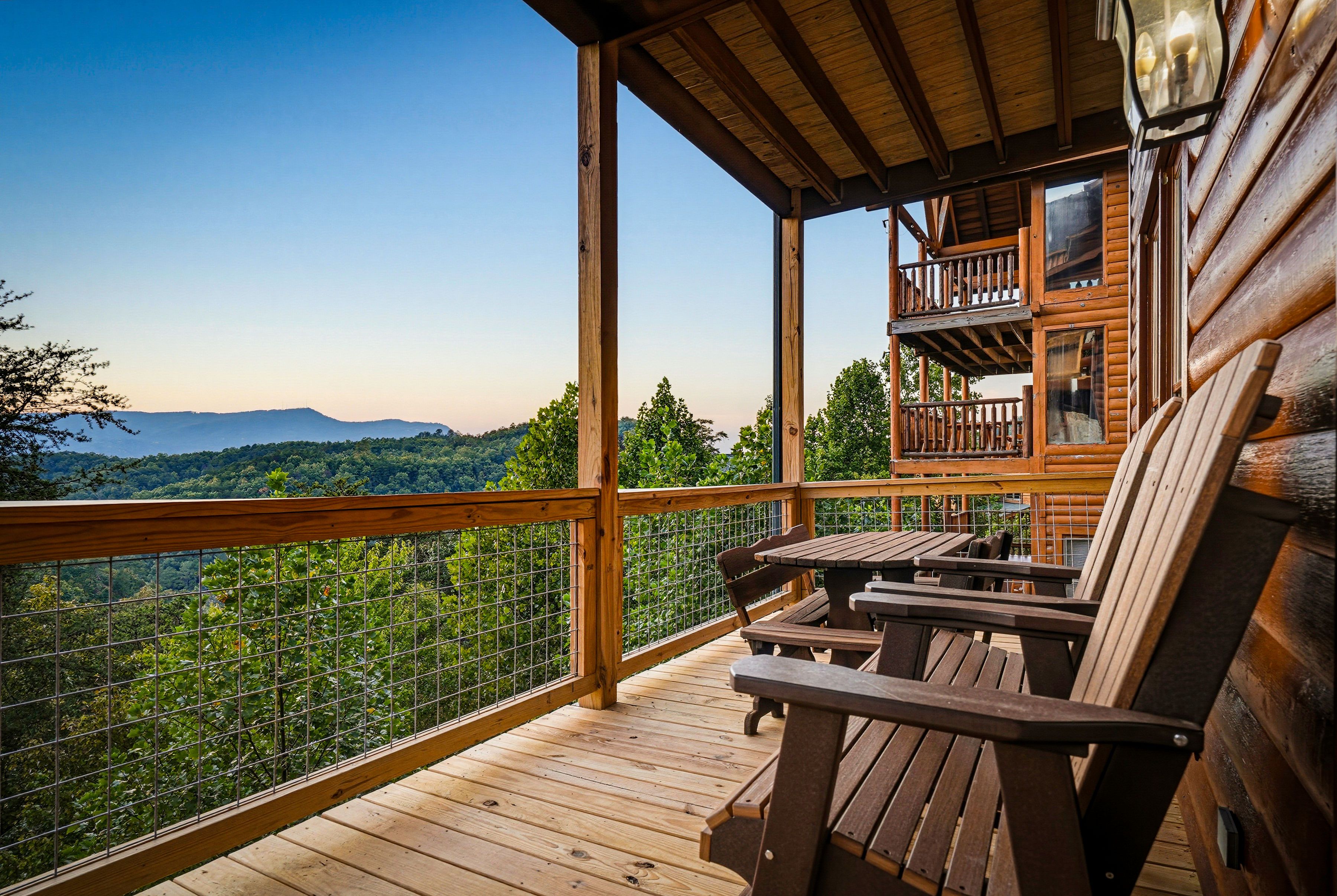 <span class="name">Unwind on the bench glider while enjoying the mountain air</span>