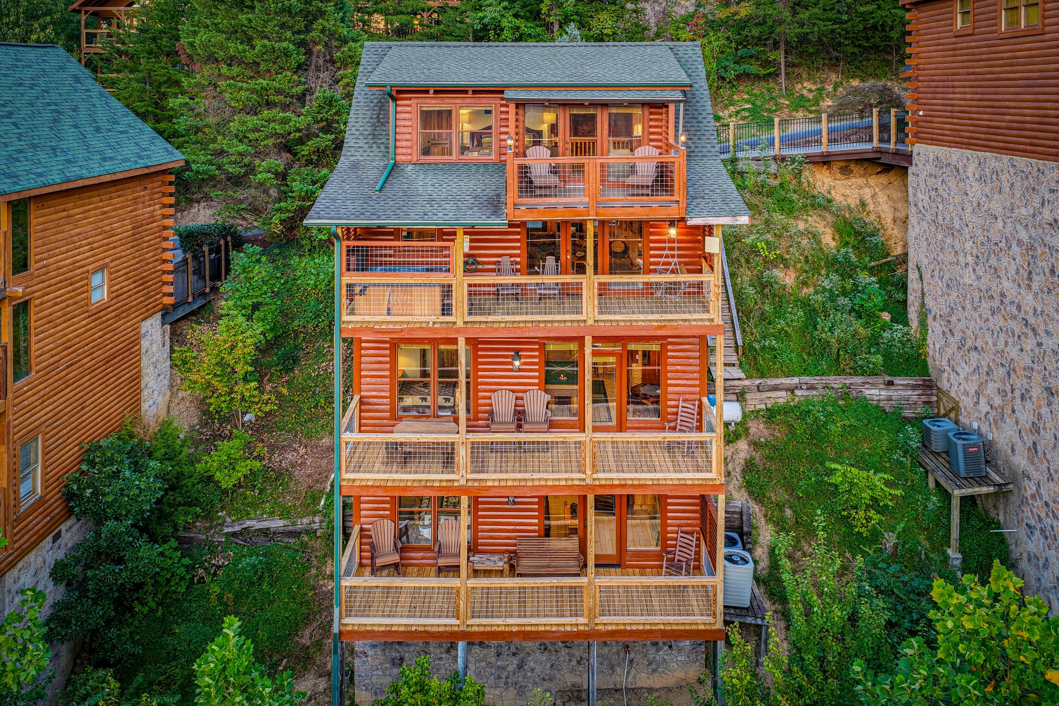 <span class="name">Four-story cabin surrounded by Smoky Mountain scenery</span>