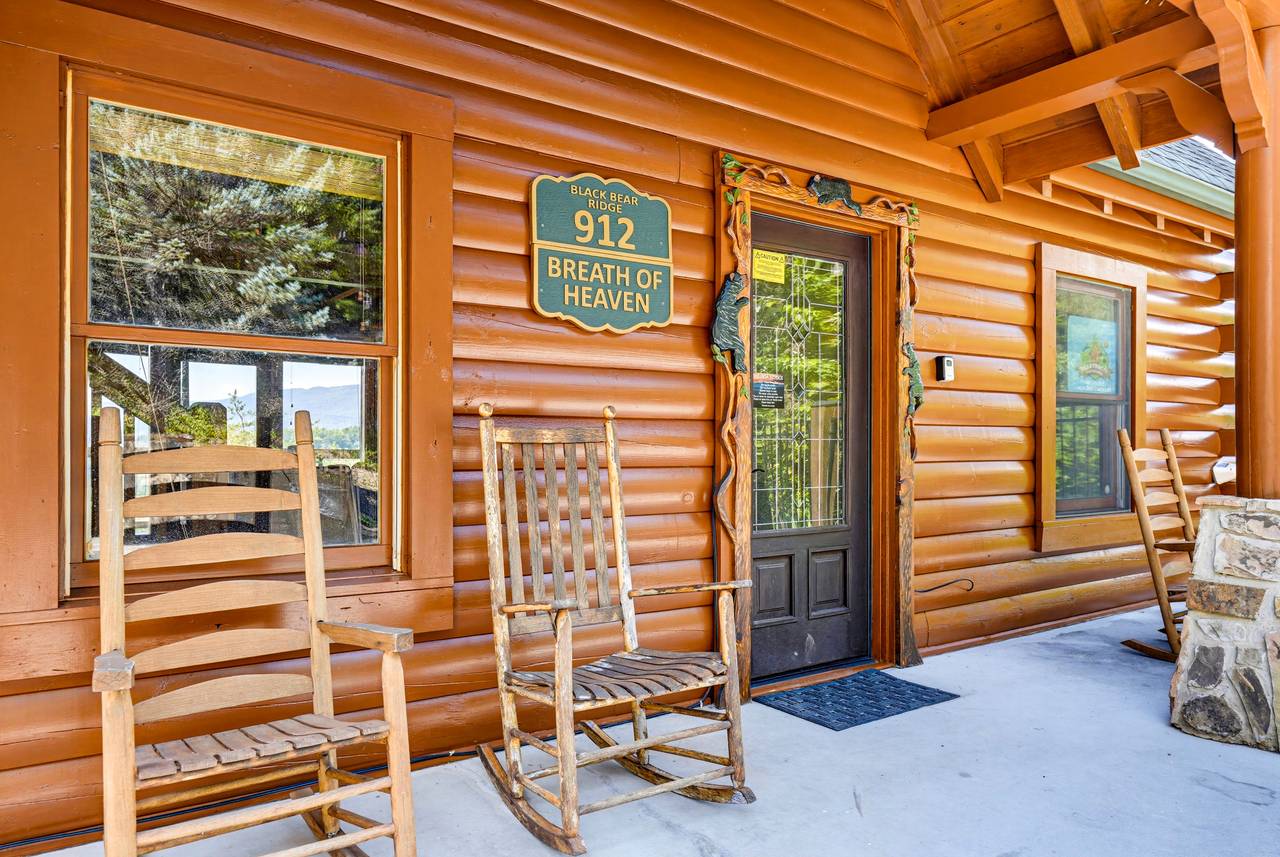 <span class="name">Front porch rocking chairs welcome you to the cabin</span> <span class="name">Front porch rocking chairs welcome you to the cabin</span>