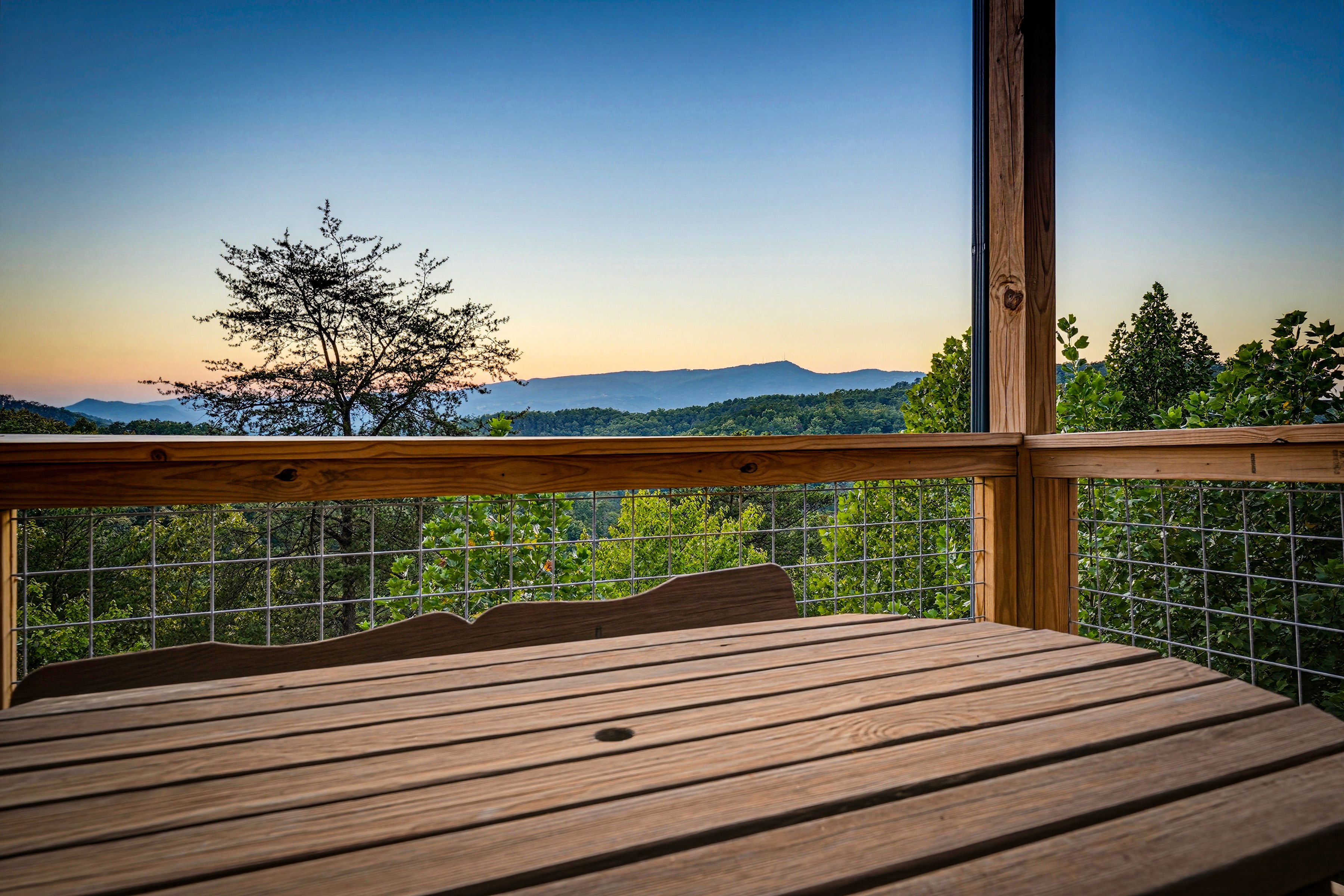 <span class="name">Enjoy meals outdoors at the deck table and chairs</span>
