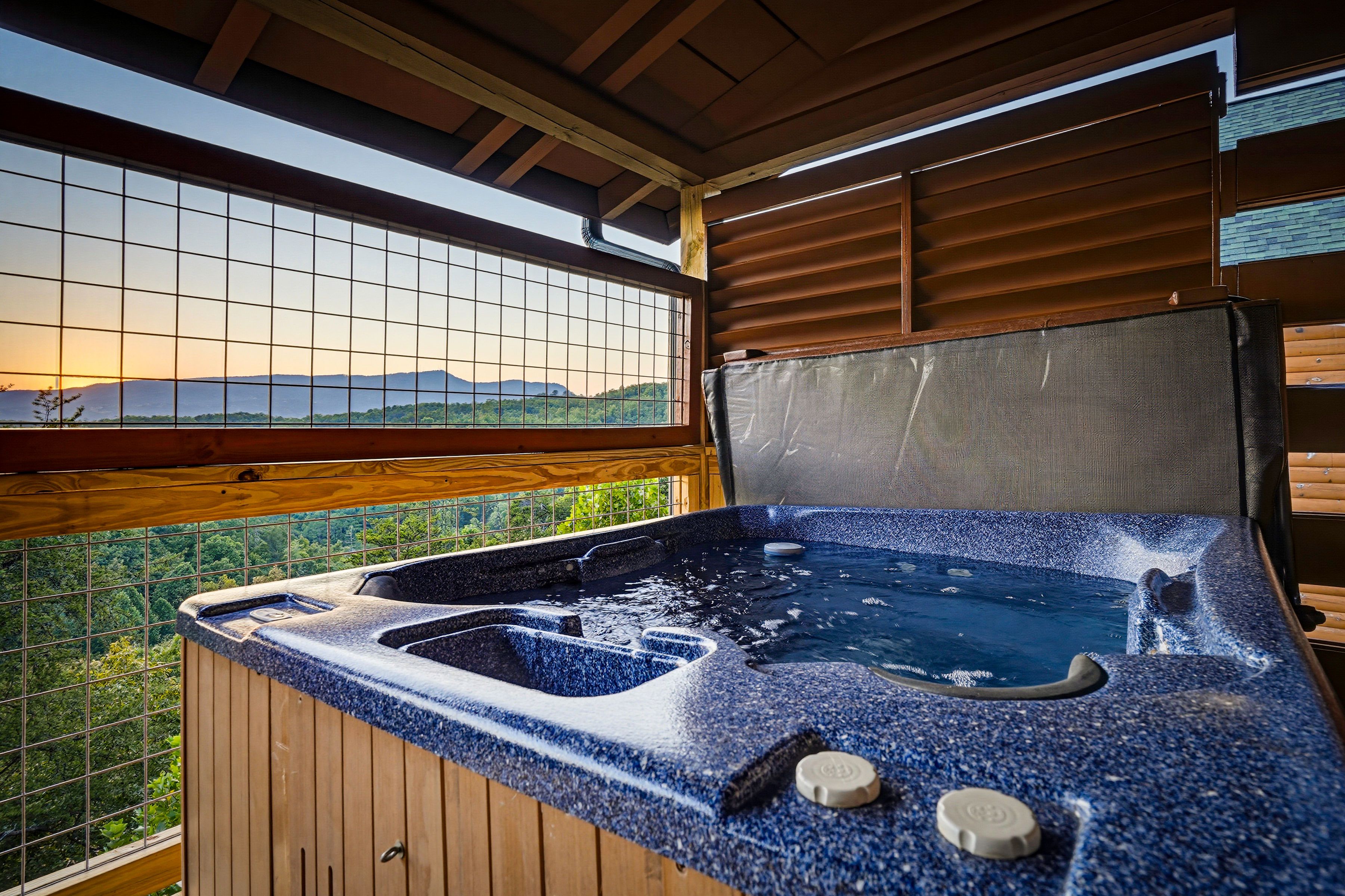 <span class="name">Private hot tub offers relaxation surrounded by mountain views</span>