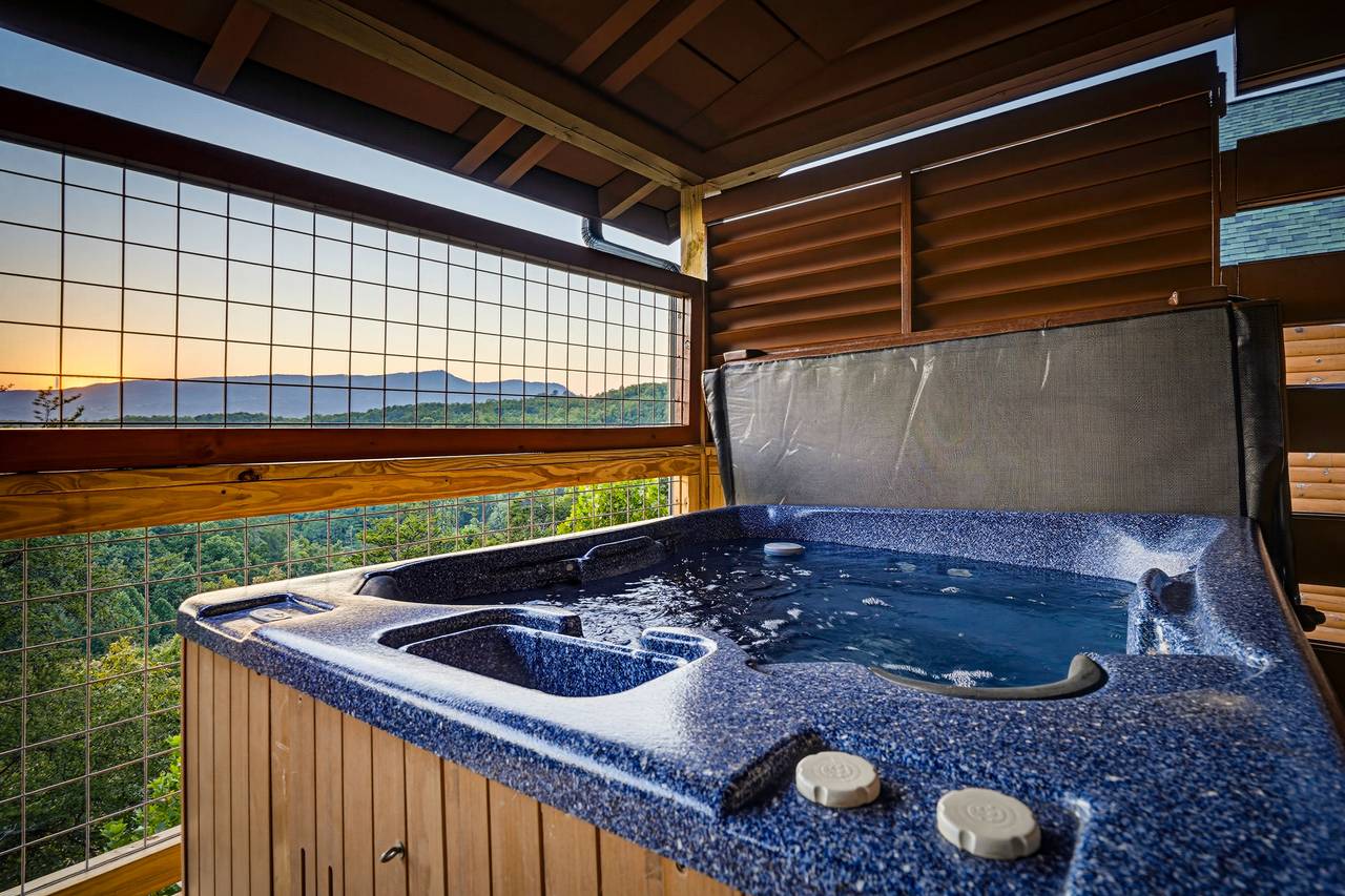<span class="name">Private hot tub offers relaxation surrounded by mountain views</span> <span class="name">Private hot tub offers relaxation surrounded by mountain views</span>