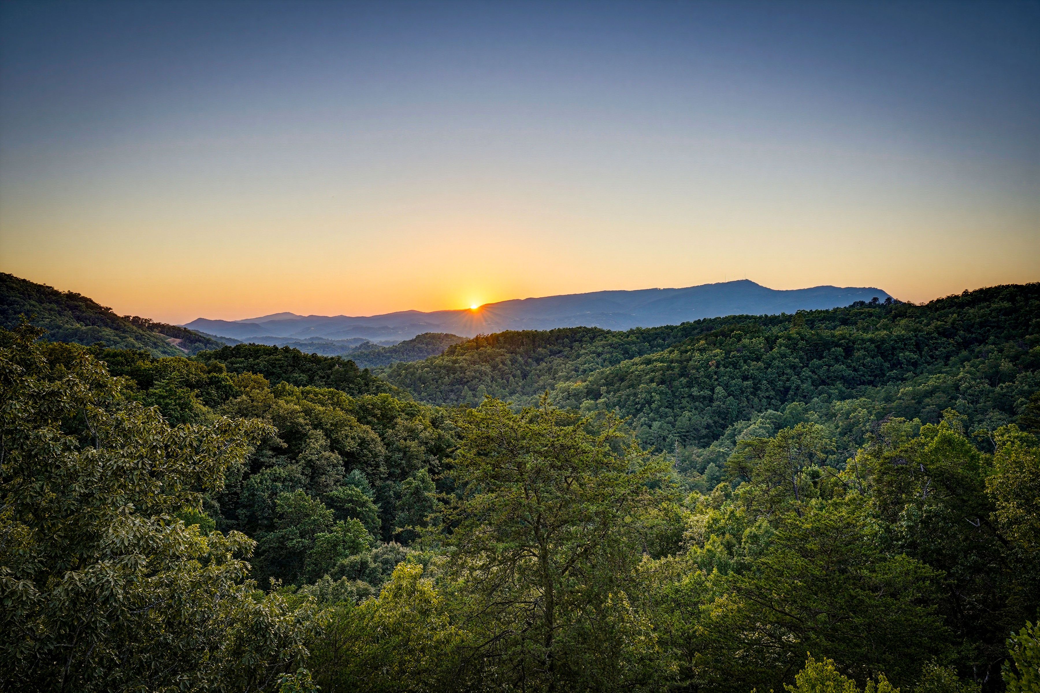<span class="name">Enjoy peaceful mountain views from every level</span>