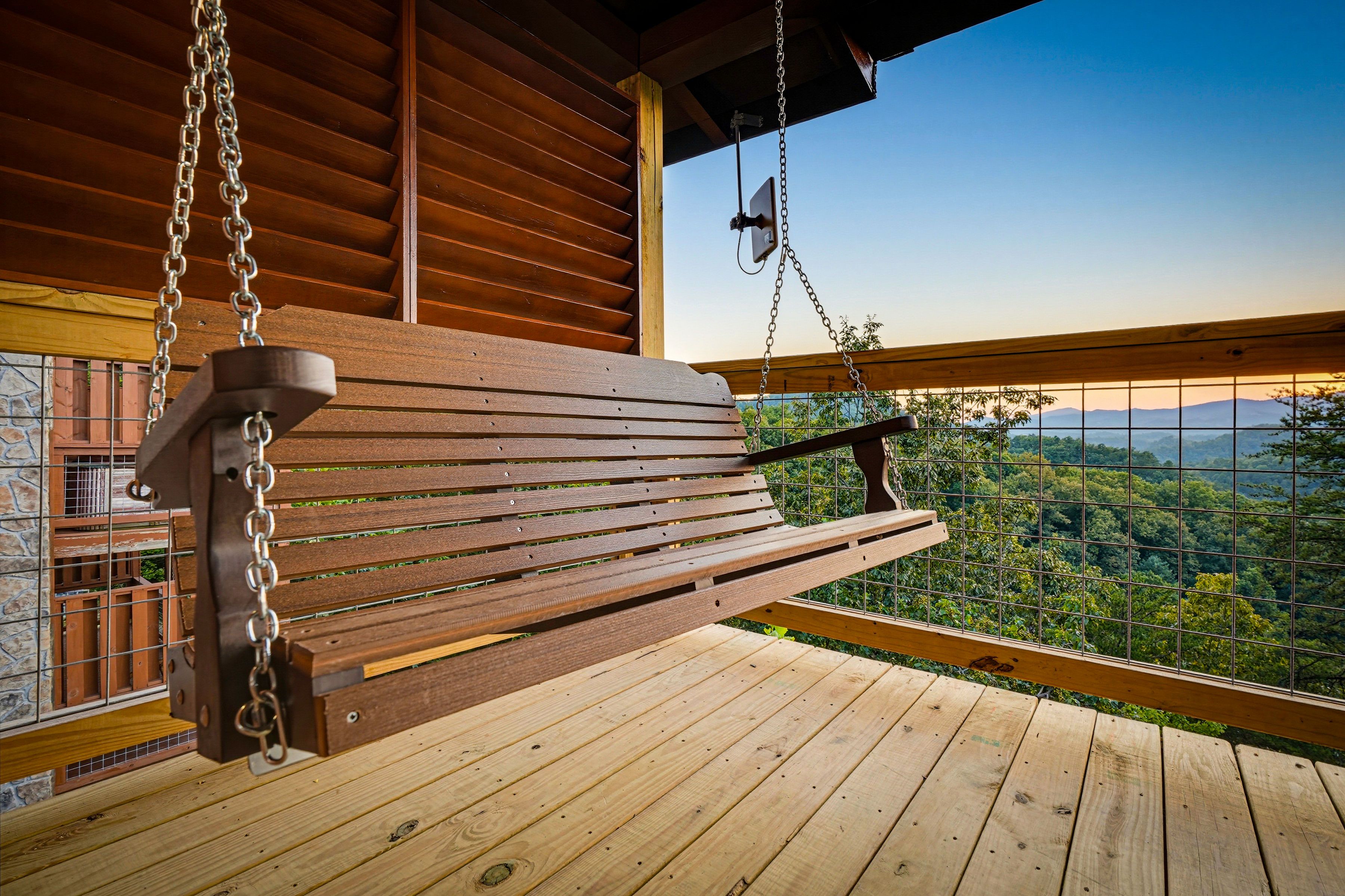 <span class="name">Relax on the porch swing and take in the mountain setting</span>