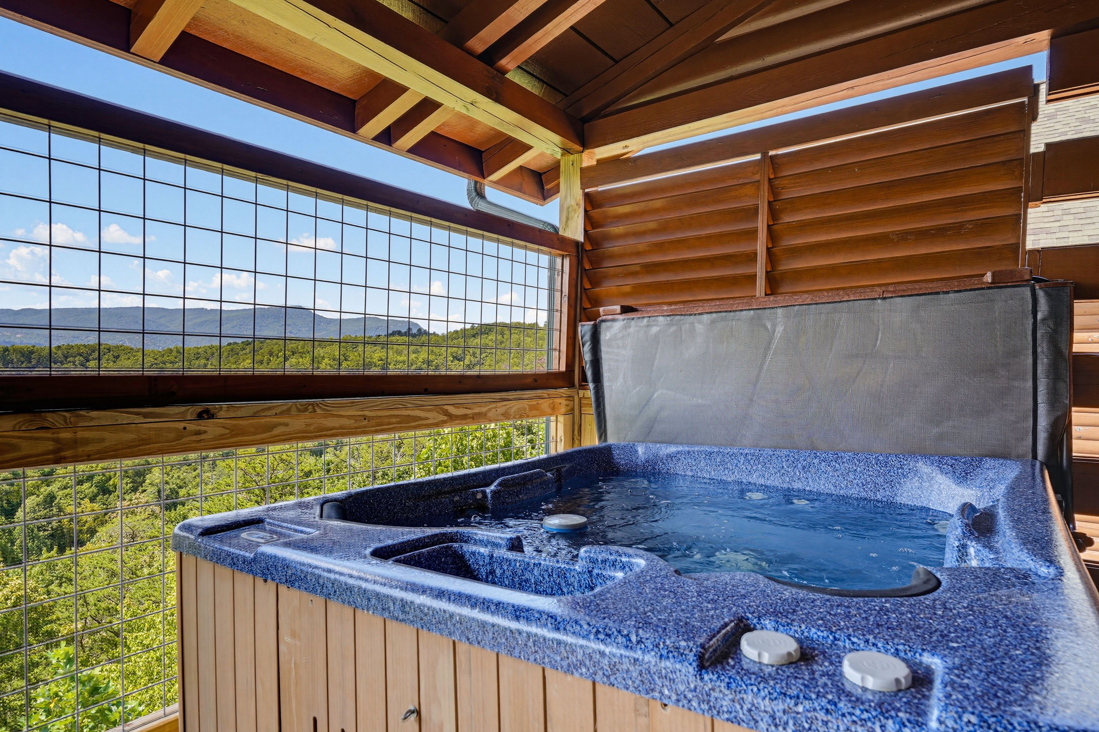 <span class="name">Soak in the private hot tub on the entry-level deck</span>