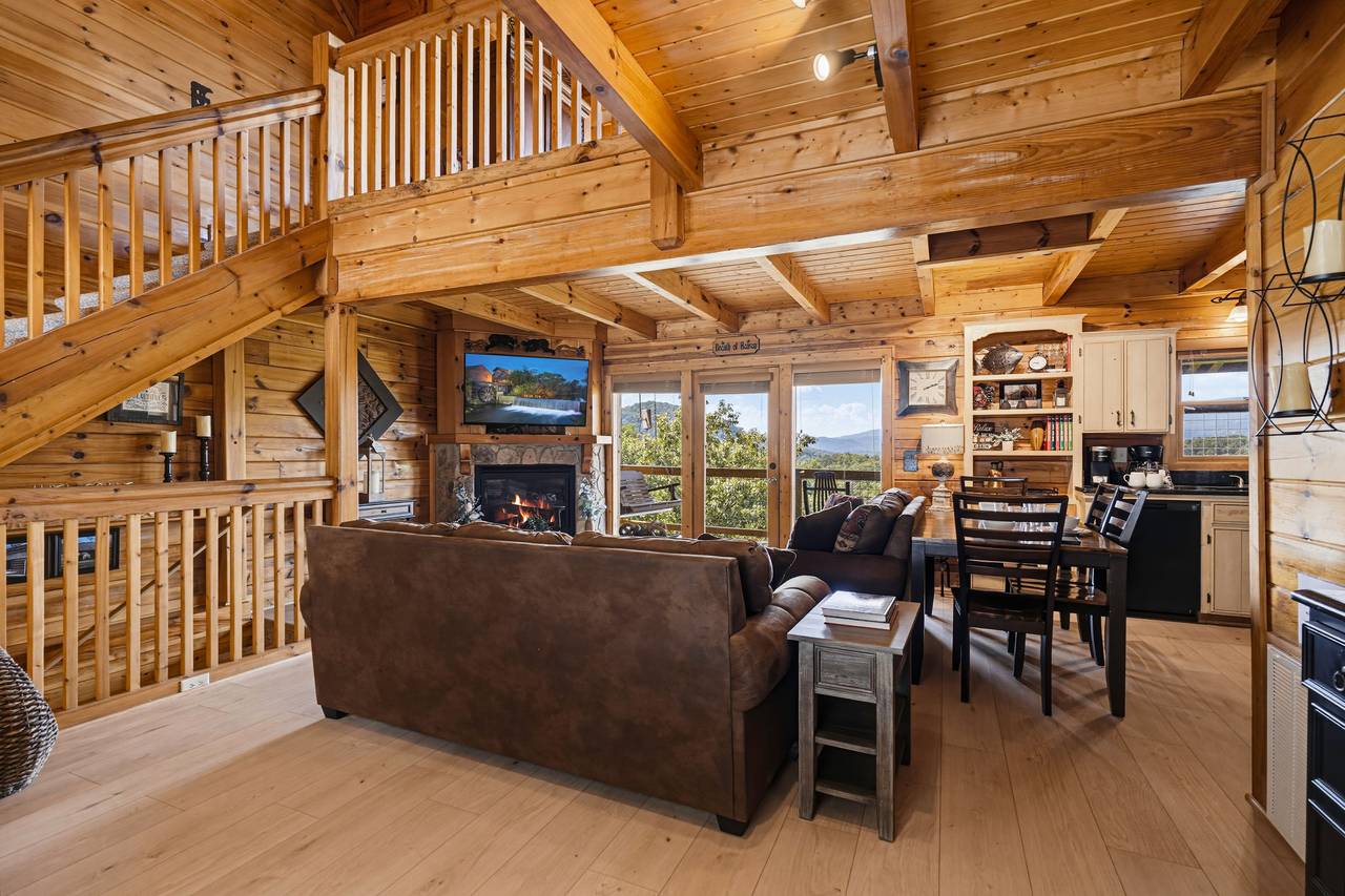 <span class="name">Gather in the entry-level living room with mountain views</span> <span class="name">Gather in the entry-level living room with mountain views</span>