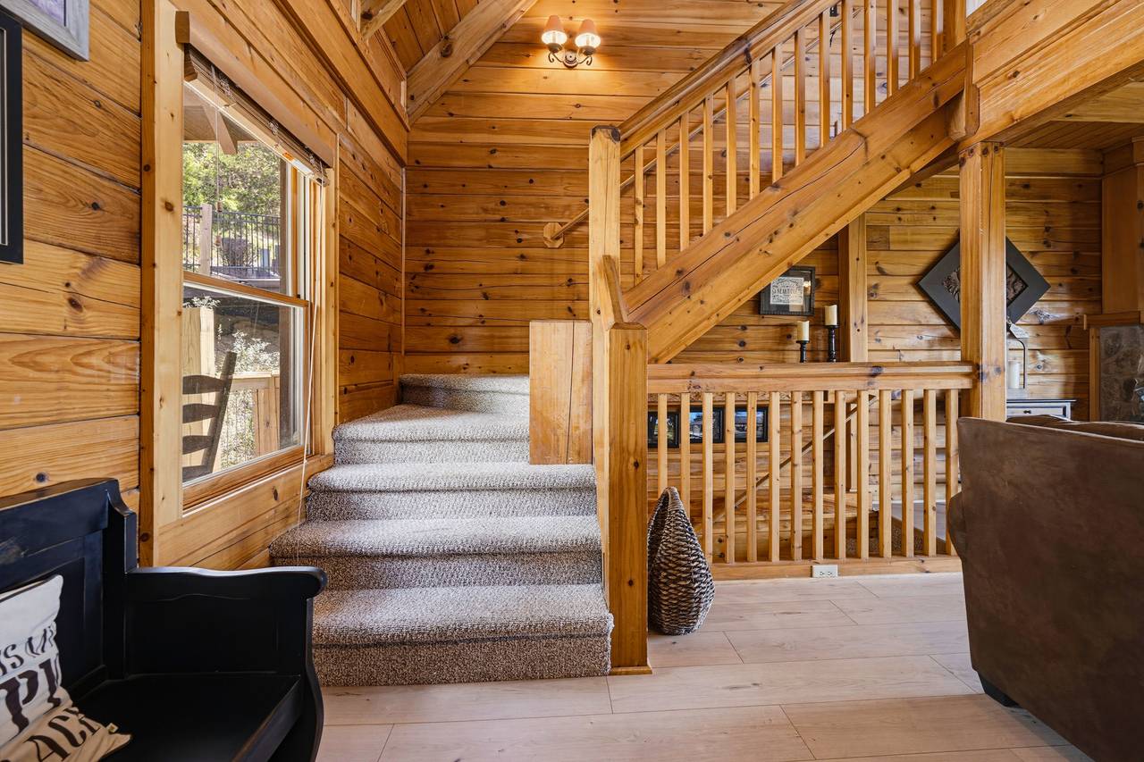 <span class="name">Staircase from entry level to upper level</span> <span class="name">Staircase from entry level to upper level</span>