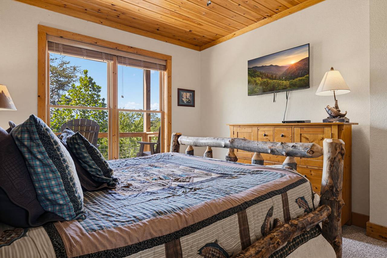 <span class="name">Lower-level king bedroom includes a TV and closet</span> <span class="name">Lower-level king bedroom includes a TV and closet</span>