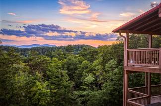 <span class="name">Gorgeous Smoky Mountain views await from the cabin's decks.</span> <span class="name">Gorgeous Smoky Mountain views await from the cabin's decks.</span>