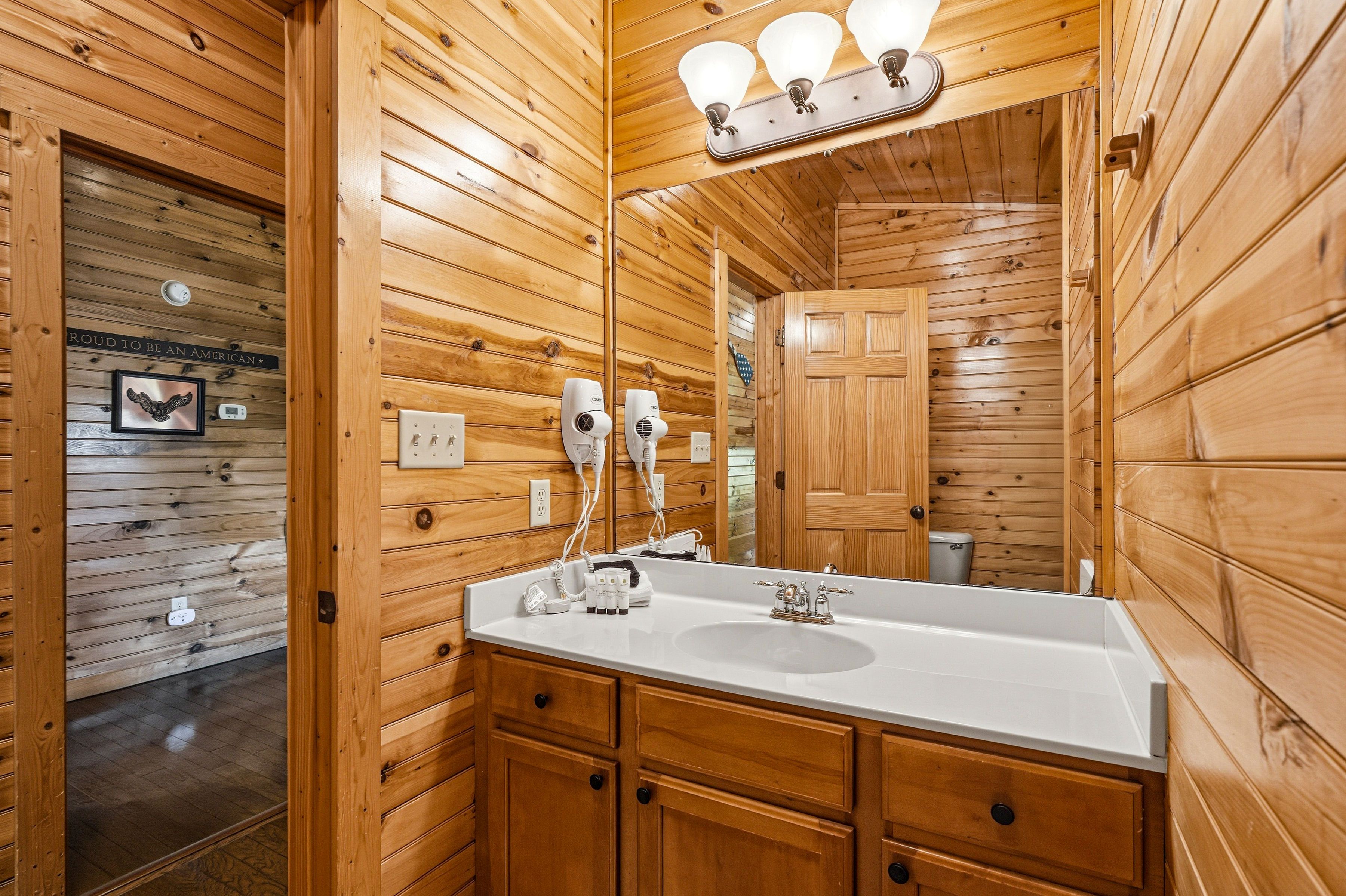 Bathroom with tub shower combo and vanity