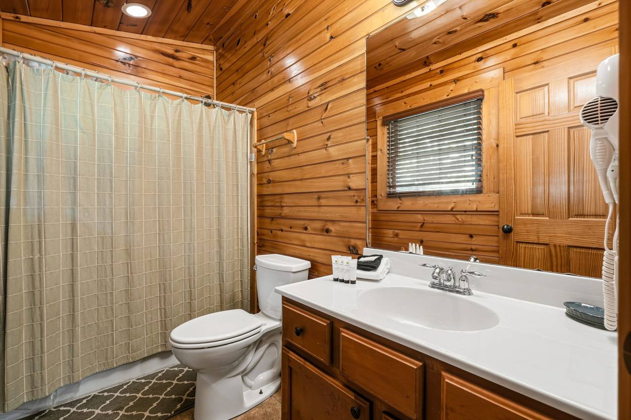 Bathroom with tub shower combo and vanity Bathroom with tub shower combo and vanity