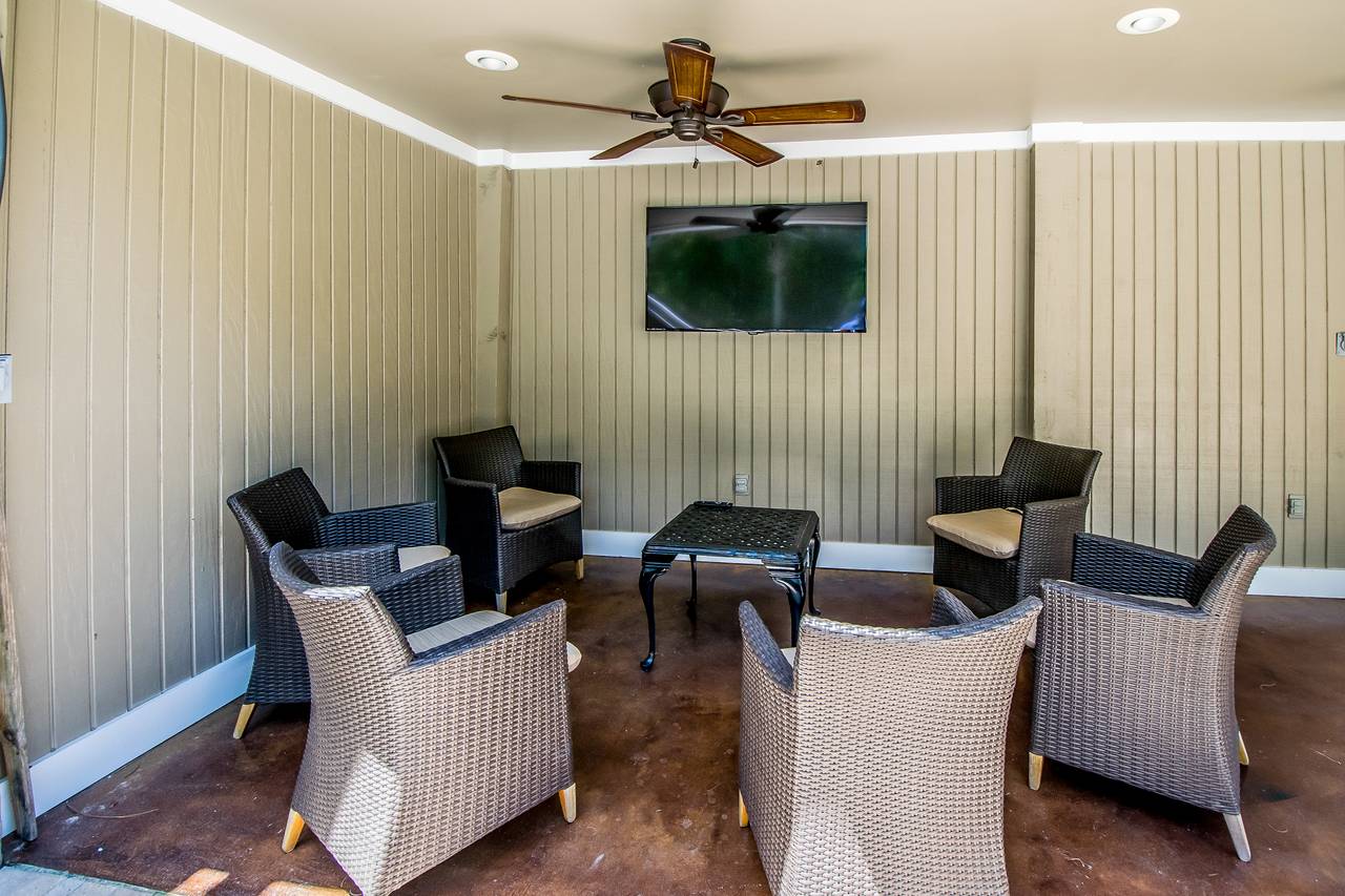 Covered Sitting Area with TV Covered Sitting Area with TV