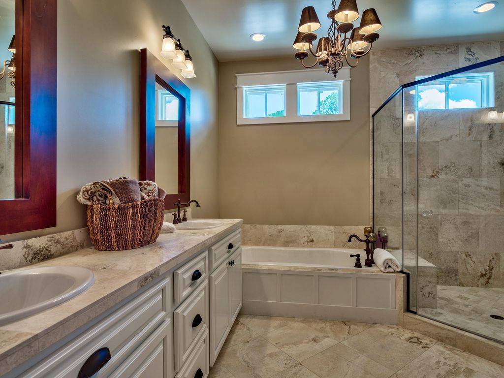 Master Bathroom with Double Vanities, Tub, & Glass Enclosed Show